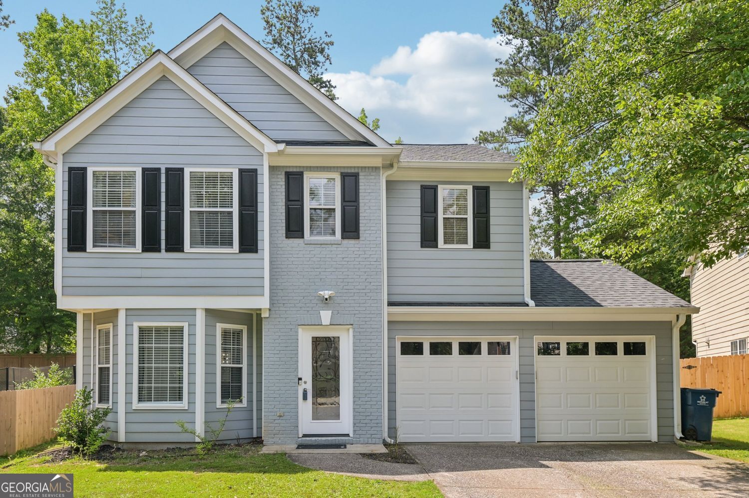 Welcome to this ready-to-move-in home in the popular Henderson Village. It's just minutes from Downtown Alpharetta and Avalon. This home offers the perfect blend of convenience, charm, and unbeatable location. Tucked away on a quiet cul-de-sac, the home boasts a fully fenced backyard and a long list of recent upgrades. You'll have peace of mind with the new Hardiplank siding, gutters, roof, AC, and ductwork, as well as all-new kitchen appliances. The kitchen and bathrooms have been beautifully renovated. The home also boasts new paint inside and out, along with new garage doors. Additionally, it has updated front and rear entry doors and fresh window blinds. The outdoor space has also been improved, with 19 pine trees cleared to open up the backyard for maximum enjoyment. Inside, you'll find three bedrooms, two and a half baths, and updated flooring, all set within a bright and welcoming layout. As a resident of Henderson Village, you can enjoy swimming and tennis amenities, a clubhouse, and a fitness center. Plus, top-rated schools make it an ideal place to live. This is a rare opportunity to enjoy modern updates and community living in one of Alpharetta's most desirable areas.