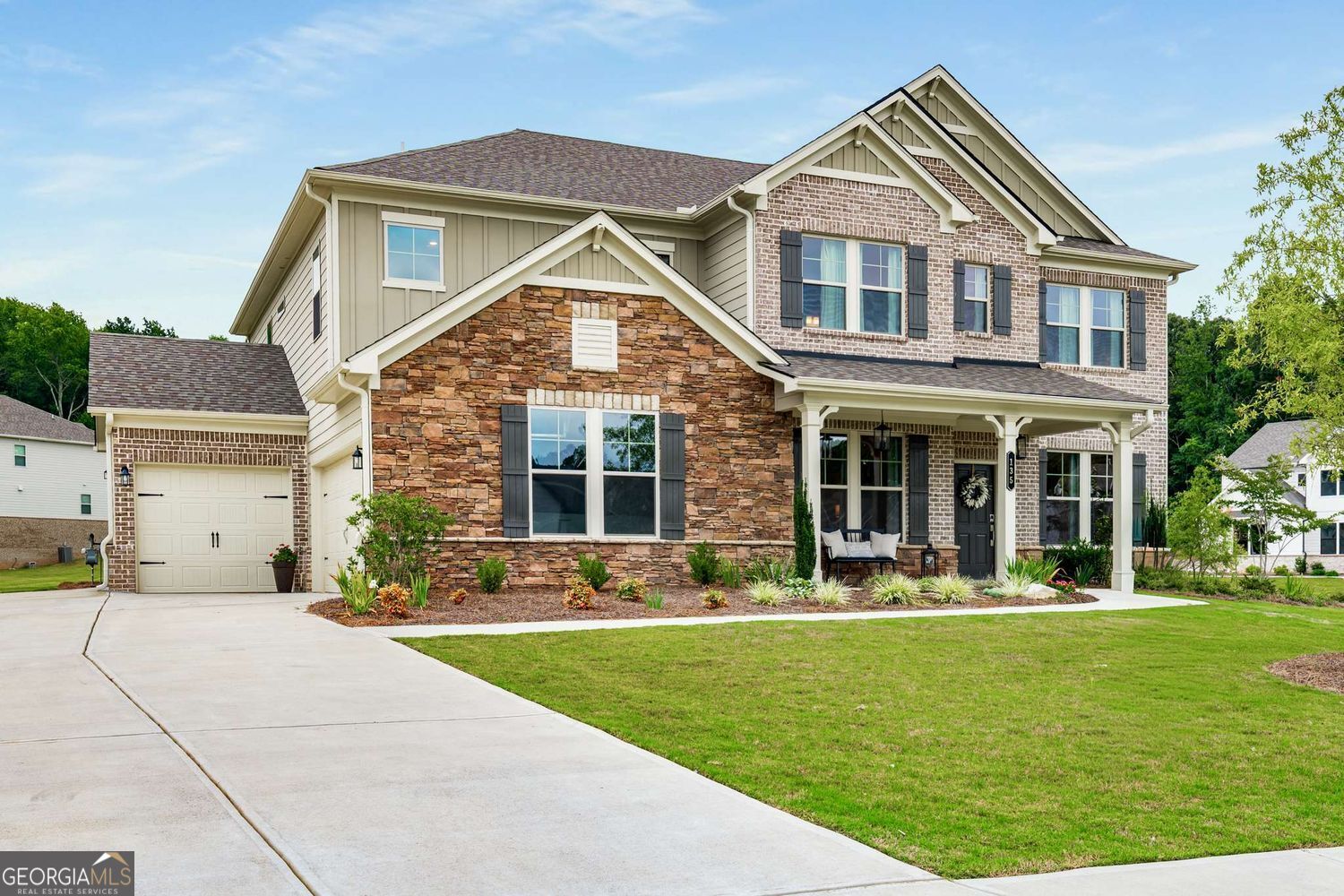 || LANDSCAPED CORNER LOT || || 3-CAR GARAGE || || CUSTOM MUDROOM WITH BUILT-IN BENCH || || UPGRADED LIGHTING THROUGHOUT || || REAL WOOD BOARD AND BATTEN TRIM || || UPGRADED SPRAY FOAM INSULATION & RHEIA HVAC SYSTEM || || DUAL LAUNDRY ROOMS (UP & DOWNSTAIRS) || || ZONED FOR MACEDONIA ELEMENTARY IN TOP-RATED CREEKVIEW SCHOOL DISTRICT || || 1 MILE TO WOODMONT GOLF & COUNTRY CLUB || || MINUTES TO MILTON, ALPHARETTA & CANTON || || LOW SUMMER UTILITY BILLS AVERAGING $185.11/MO || || $1,500 CREDIT TOWARDS WOODMONT CLUB MEMBERSHIP || ** What You'll See ** From the moment you pull up to this beautifully LANDSCAPED CORNER LOT, you'll notice the pride in ownership and charming curb appeal. Inside, your eye is immediately drawn to the REAL WOOD BOARD AND BATTEN ACCENTS that elevate every hallway and room. Stylish UPGRADED LIGHTING FIXTURES create warm ambiance throughout, while LAMINATE FLOORING gleams underfoot and OAK HARDWOODS add elegance to the stairs and landing. Thoughtful touches like BUILT-IN CABINETS IN THE FAMILY ROOM and the CUSTOM MUDROOM WITH BENCH offer daily functionality that looks as good as it works. ** What You'll Hear ** Enjoy peaceful evenings thanks to the QUIET OPERATION OF THE RHEIA HVAC SYSTEM, designed for optimal comfort without noise. Indoors, the home remains a calm retreat, even during busy mornings, with the sound of laundry humming in one of the TWO LAUNDRY ROOMS (UP & DOWNSTAIRS)-a game-changer for busy households. Step out onto the COVERED PATIO just off the sunroom and hear the breeze through mature landscaping, just far enough from the bustle, yet close to everything. ** What You'll Feel ** You'll feel the difference in air quality and temperature control made possible by SPRAY FOAM INSULATION IN THE ATTIC and the ENERGY-EFFICIENT HVAC SYSTEM. With SUMMER UTILITY BILLS AVERAGING ONLY $185.11, the comfort comes with savings. Throughout the home, WIRE SHELVING-CUSTOM-FITTED TO EACH CLOSET-adds practical storage solutions, while the WOOD SHELVING IN THE MASTER BATH TOILET CLOSET makes daily essentials easy to grab and neatly tucked away. ** What You'll Experience ** From prepping dinner in your CHEF'S KITCHEN WITH 36" GAS RANGE, CHIMNEY HOOD, QUARTZ COUNTERTOPS, and UNDERCABINET LIGHTING to loading up gear in your spacious 3-CAR GARAGE, this home is built for real life. Just 1 mile away, WOODMONT GOLF & COUNTRY CLUB invites you to enjoy the POOL, TENNIS COURTS, and ON-SITE RESTAURANT with optional membership-plus a $1,500 SELLER CREDIT to help get you started. Zoned for sought-after MACEDONIA ELEMENTARY in the CREEKVIEW DISTRICT and minutes from MILTON, ALPHARETTA, and CANTON, you'll experience not only a beautiful home but an unmatched lifestyle of convenience and community. Transferable home warranty available!