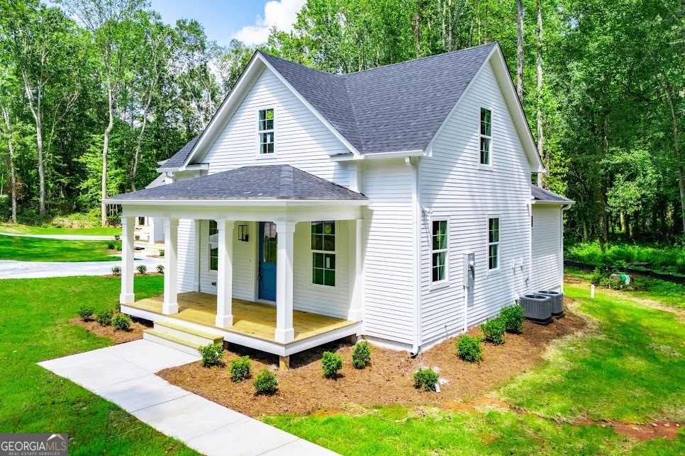Beautifully DESIGNED, carefully crafted NEW CONSTRUCTION homes on a quiet street with NO HOA! Up to $3500 in incentives with approval with preferred lender. Ask the listing agent for more info. Discover unparalleled quality in this new construction home, where every detail has been thoughtfully designed for luxury, efficiency, and timeless appeal. Gourmet Kitchen with stunning Calcutta ultra quartz counters with FULL matching backsplash, SOLID WOOD cabinets with dovetail soft-close drawers, and a huge island perfect for entertaining. High-end finishes, with 9-12ft ceilings, 8" baseboards, 20MM Andover Hatfield LPV flooring, matte black lighting and hardware throughout, chrome Delta/Kohler plumbing fixtures, and stainless steel appliances for a sleek, modern look. Built with superior materials, like the 2x6 framing, and attention to energy efficiency, like concrete fiber siding & soffit, energy-efficient Pella windows, spray foam insulation, encapsulated crawlspace, and a dual-zoned HVAC system. Quiet and convenient, nestled on a peaceful street with a tranquil creek flowing in the backyard, just steps from the Bowdon Library and walking distance to downtown Bowdon. *Eligible for $0 money down loan* ***3 other exquisite homes to choose from*** Contact the listing agent for more information. Schedule your private tour today!