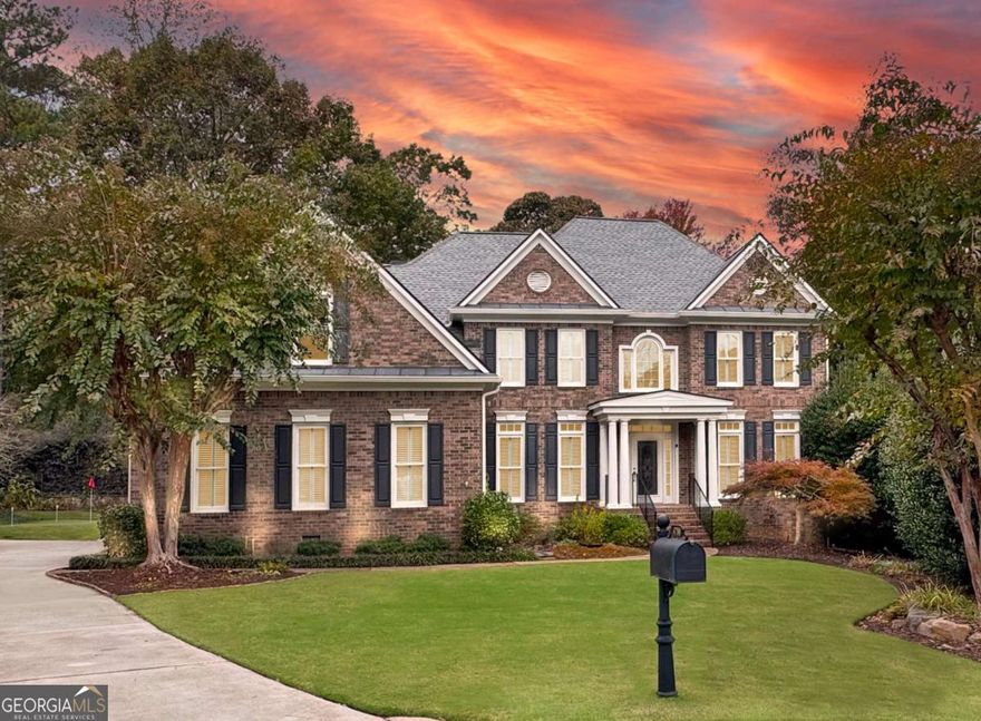 WOW! This amazing, stately home has too many great features to list! You will love this beautiful 4 bed, 4.5 bath, 3-sided brick beauty with a 3-car garage, enclosed swimming pool, full finished terrace level, enormous primary suite, and so much more, all situated on a quiet cul-de-sac in the swim/tennis community of The Ridge at Easthampton in the coveted Pope High School district of East Cobb! The spacious main living level boasts high ceilings and gleaming hardwoods, formal living room with French door entry, separate dining room, two-story fireside great room with floor-to-ceiling windows, a window-clad office/bonus room, cozy fireside den with stacked stone fireplace and wet bar, all-season room, and a heart-of-the-home, eat-in kitchen complete with stone countertops, stainless appliances, breakfast bar open to the great room, and adjacent breakfast area! Upstairs, you'll find three spacious secondary bedrooms- one with an ensuite bath and the other two sharing a Jack & Jill bath, and the beautiful oversized primary suite with fireplace, trey ceiling, additional large sitting room that could be converted into a closet, dual custom closets, and large ensuite bath featuring separate vanities, walk-in shower and jetted tub. The full daylight walk-out terrace level includes an additional family/multi-purpose room with fireplace, game/media room, full bathroom, workshop, and loads of extra finished and unfinished storage space! Step outside from the terrace level to the convenient, enclosed heated gunite swimming pool! This home offers plenty of opportunity for outdoor entertaining with a spacious flagstone patio off of the den/keeping room with lots of space for dining or lounging, as well as a terrace level green space, and a driveway-level putting green! Fresh interior paint! New carpet throughout! Resort-style amenities include fishing, community docks, swim/tennis, clubhouse, fitness center, and more! Fabulous location near Avenue East Cobb, plenty of shopping, dining & entertainment! Award-winning East Cobb school district! Don't miss the opportunity to make this exceptional residence your new home sweet home!