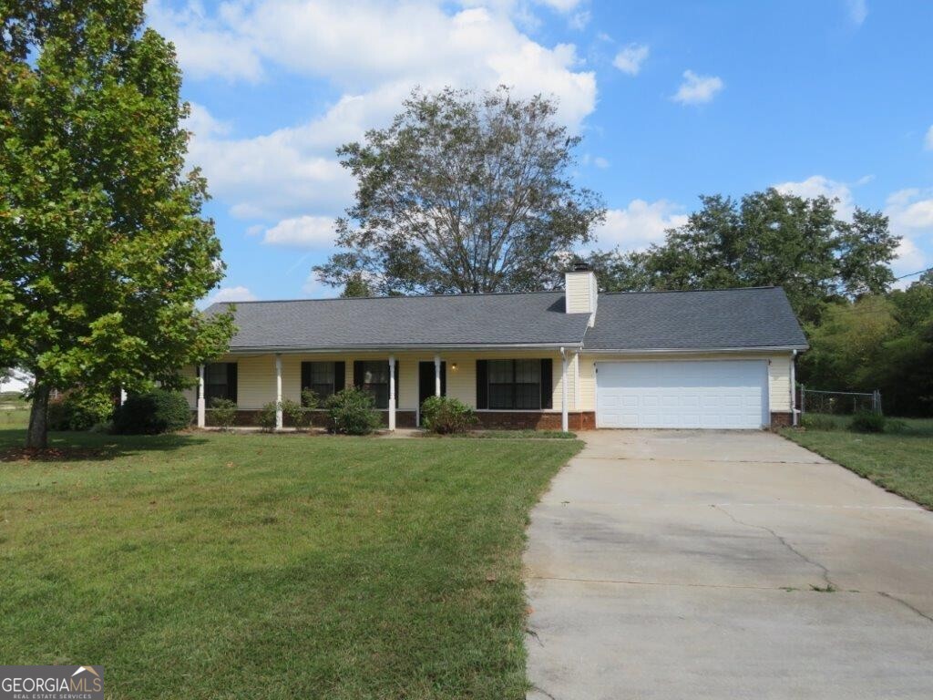 Beautiful, ranch home on a 0.75 acre, corner lot! Rocking chair front porch! Spacious living room! Separate dining/breakfast area off kitchen! Kitchen features white cabinets, stone counters, and stainless steel appliances! Primary bedroom features his & her separate closets and a private full bathroom! Two spacious secondary bedrooms share another full bathroom! Rear patio overlooks level, fenced backyard! A must see! Don't miss out!