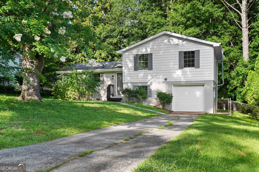 Photo of 4424 Twin Creek Drive NE, Kennesaw, GA 30144 (MLS # 10819472)
