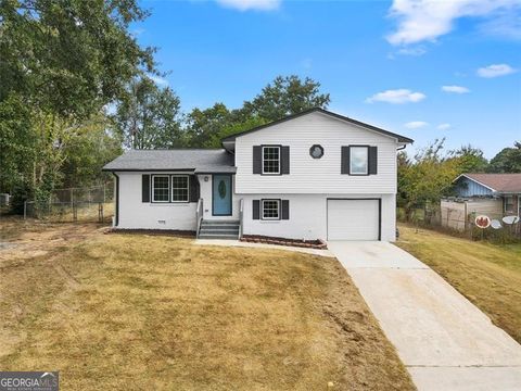 Photo of 2436 WOOD VALLEY Drive, Morrow, GA 30260 (MLS # 10622190)