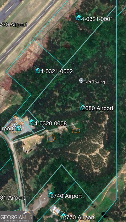 Rare Large Tract Light Industrial Property in Cherokee County. Easy Access to Major Highways. Seller Has Permit Ready Plans for 7 Building Complex. Two Houses are on site that were just vacated.