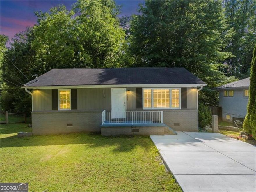 Welcome to 1677 Wayland Circle NE!  **2.2% ASSUMABLE MORTGAGE** This charming and thoughtfully renovated bungalow is nestled in the heart of Brookhaven's desirable Grant Estates Community, and offers 2 bedrooms, 1.5 baths and 999 square of feet of stylish living space on a prime lot, making it an ideal primary residence, rental property, or future new build.    Step inside to discover a light-filled interior with multiple flexible living spaces, including a dedicated dining room, cozy living area, and a bonus room ideal for a home office or additional lounge space. The updated kitchen features modern finishes and ample storage, making it both functional and inviting, while the renovated full bath adds a clean, contemporary touch.  Enjoy the outdoors year round in the spacious front and back yards, or entertain guests on the oversized back deck, perfect for relaxing, and enjoying The Georgia weather and scenic views  The extended driveway provides plenty of generous parking, ideal for hosting.    Located just minutes from top rated restaurants, boutique shops, green spaces, and major commuting routes, this home offers the perfect blend of comfort, charm, and convenience.  Don't miss your chance to own in one of Brookhaven's most sought after Communities!  Schedule Your Showing Today!