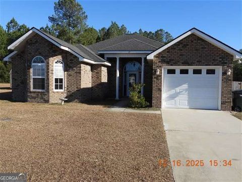 Photo of 172 Lincoln Way Ne, Ludowici, GA 31316 (MLS # 10659057)