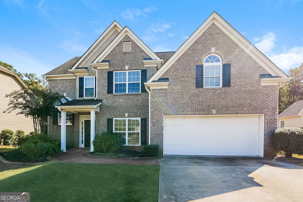 Photo of 377 Champions Drive, Fairburn, GA 30213 (MLS # 10653229)