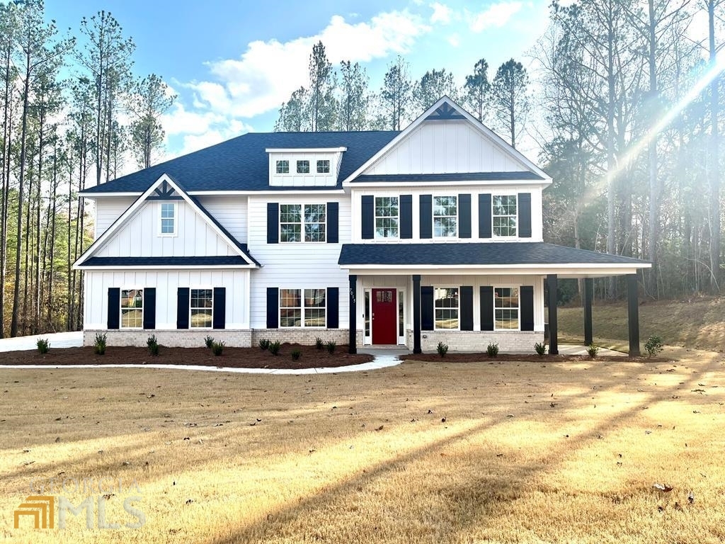 A Hughston Community. Welcome to our Magnolia B Floorplan. Absolute Favorite Floorplan w/ 3669 SF of Elegant Living Space. Nestled on Almost an Acre in Upatoi this Gorgeous Home is Conveniently located in Muscogee County. A Hughston Homes Luxury Spec, this home has all the Bells & Whistles. Wrap Around Front Porch, Entry Foyer, Formal Dining Room, Large Great Room, Open Kitchen & Breakfast, Media Room, 5 Bedrooms, 4.5 Baths, 3 Car Garage & Our Signature Gameday Patio perfect for Outdoor Entertaining. ***Ask about or Included Home Automation*** Move in Ready w/ Custom Details! This Wrap around Front Porch is perfect for Rocking Chair Evenings. Step Into the Well-Lit Foyer, Dining Room Boasts Coffered Ceiling & Wainscoting, Spacious Great Room w/ Wood Burning Fireplace. Large Kitchen w/ Stylish Cabinetry, Stunning Quartz Countertops, a Custom Tiled Backsplash, Gourmet Kitchen Package w/ Upgraded Stainless Appliances. Large Kitchen Island Open to Breakfast Area & Walk-in Pantry. 5th Bedroom on Main Level w/ Full Bath is an Ideal Guest Suite. Owner’s Entry Boasts our Signature Drop Zone. Expansive Owner’s Suite Upstairs. Owner’s Bath features Tiled Shower & Frameless Shower Door, Garden Tub, Quartz Countertops on His & Her Vanities & Huge Walk-in Closet. Media Room creates a 2nd Living Space. Additional Bedrooms are Spacious w/ Ample Closets. Jack & Jill Bath & Full Bath located Upstairs. Durable Luxury Vinyl Plank Flooring throughout Main Living Areas. 3 Car Garage & Our Gameday Patio w/ Outdoor Fireplace is Perfect for Fall.