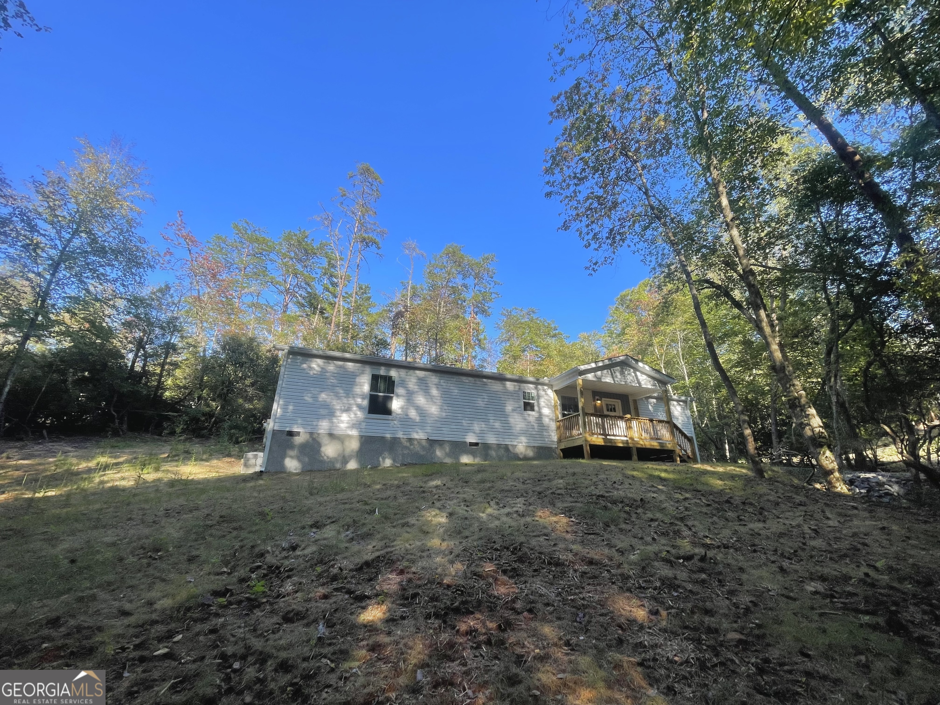 Your dream of having a BRAND NEW, One Level, 2 Bedroom 2 Bath on 0.75+/- in a beautiful community is finally here! With all NEW Appliances. Fiber Optic now available! Nicely Oaks is located near the Ingle's Grocery in Hayesville, and is very close to Chatuge Boat Ramp, Chatuge shores for the avid golfers, 30 min +/- from the Casino in Murphy! This is a must see- beautiful scenery, an abundance of wildlife , mountain views, and a gorgeous water feature! This home has beautiful drywall throughout, DuraCraft Cabinets, Frigidaire stainless steel appliances (**everything but furniture, microwave &washer &dryer**), Craftsman style front door, Ecobee Smart Thermostat, double pane windows & window treatments, w/ 2 in blinds, and carrier Furnace. Storm Doors may be available upon request! Enjoy your Heavy Duty, freestanding deck for gatherings and BBQ's! The home also features a covered portico! The 3D walkthrough is photos from another Unit in the community, Buyer should verify sq ft, 3d walk through/measurements may not be 100% accurate. Schedule a viewing today! Priced to sell! Use 710 Nicely rd, new addresses do not show in mapping. , turn rt at mailboxes