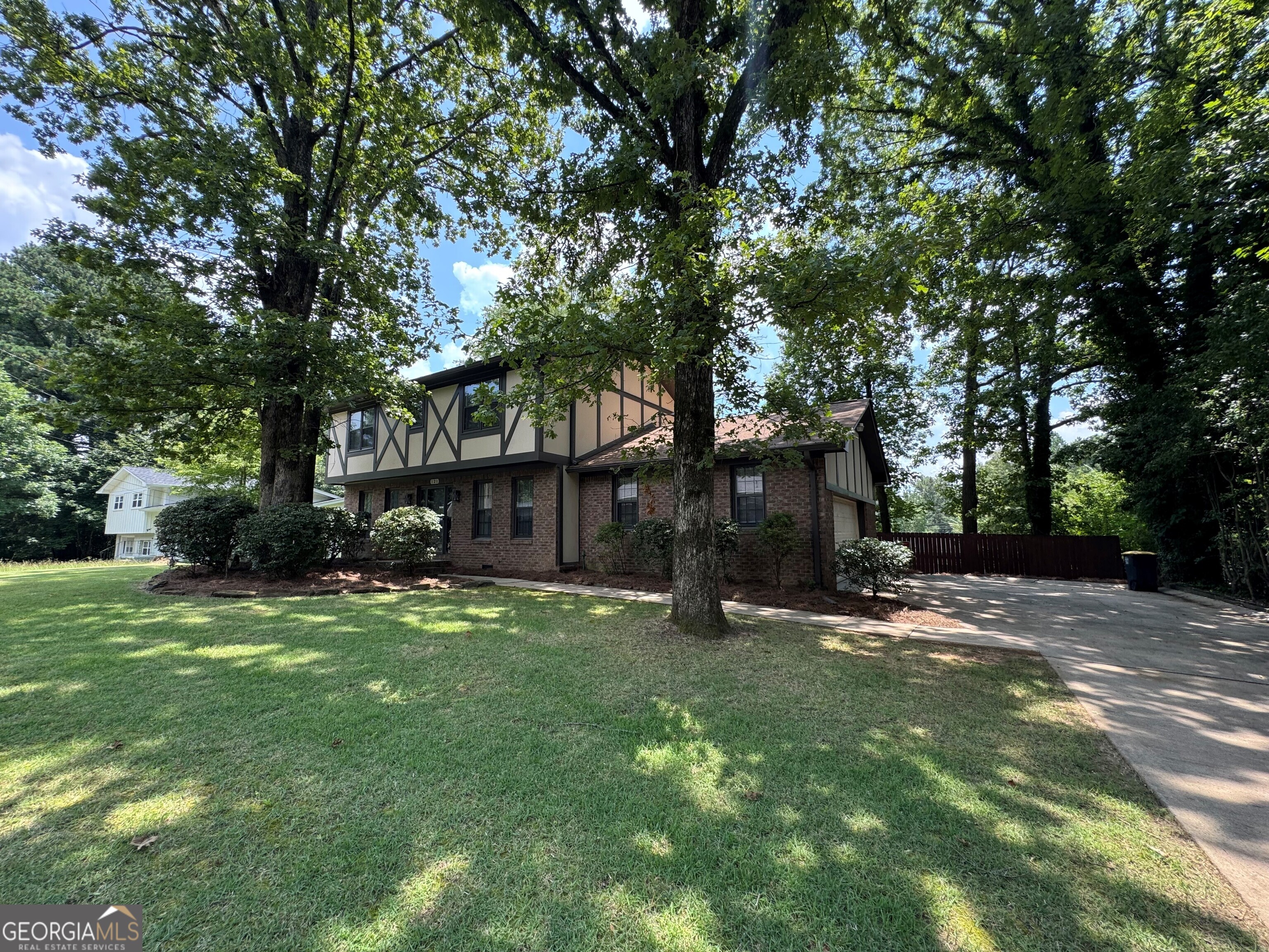 Updated Tudor style home in West Rome! This home has 3 large bedrooms, 2 full bathrooms, 1 half bathroom, dining room, ample storage space, fresh paint inside and out, new LVP flooring, new Quartz countertops, new kitchen appliances, new plumbing and light fixtures, two car garage, Carrier HVAC system, large fenced back yard and more. Please contact agent for questions and to schedule a tour!