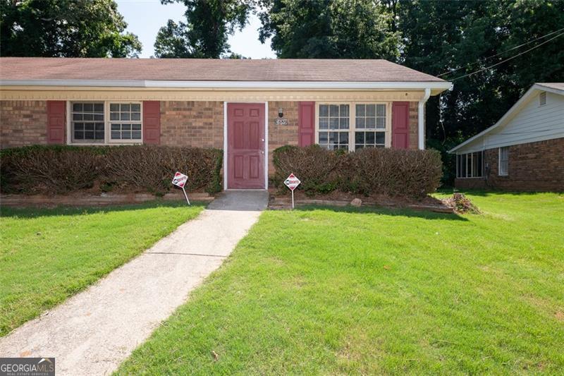 Welcome to this beautifully maintained duplex in Lawrenceville, where comfort, convenience, and charm come together to create the perfect place to call home. From the moment you enter, you'll feel the warmth of the fully carpeted interiors, inviting you to relax and unwind in a space designed for everyday comfort. The bright, closed-in back porch offers a versatile retreat, perfect for morning coffee, working from home, or hosting friends. The modern kitchen, featuring a sleek electric glass-top stove, makes meal prep both stylish and efficient. Enjoy the added peace of mind that comes with your dedicated parking space, providing secure and easy access right at your doorstep. Situated in the heart of Lawrenceville, you'll love being just minutes from shopping, dining, parks, schools, hospitals, and major highways, making every day feel connected and convenient. This home offers exceptional value in a prime location. Please note: Applicants must have an income below 120% of the area median income (AMI) and will be enrolled in our Resident Benefits Package, designed to enhance your living experience. This is truly a home that blends style and substance, and it's ready to welcome you. Reach out today to schedule your tour and experience it for yourself. Conveniently located within 5 minutes to Downtown Lawrenceville Square, Duluth Hwy 120 Strip, which has lots of shopping and restaurants; Georgia Gwinnett College, Northside Hospital, Hwy 316, and Interstate 85.