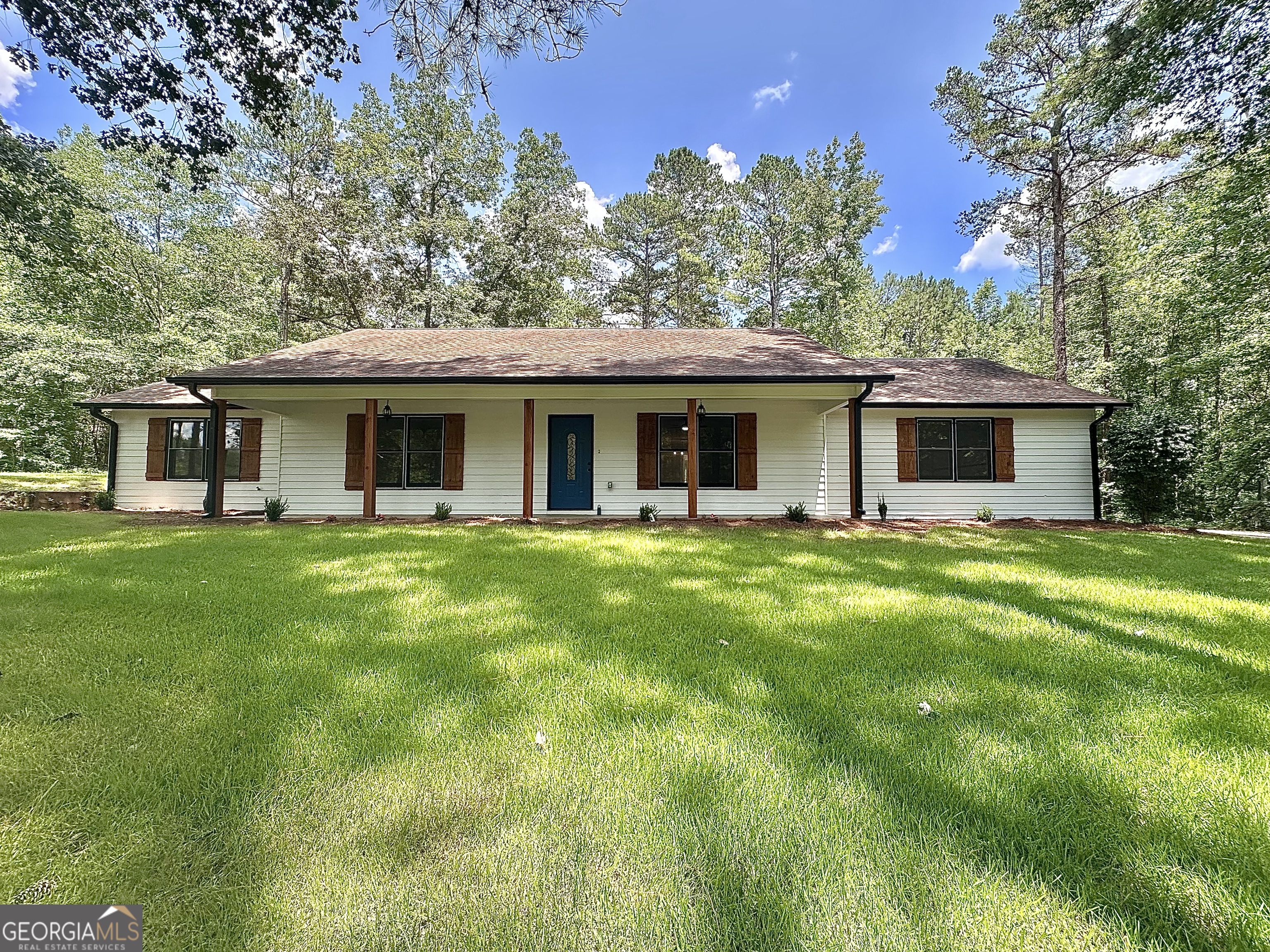 115 Creekside Lane is a meticulously renovated 3 bedroom, 2 bathroom home on 1.9 acre private lot. Large sunroom on back porch overlooking the back yard, wooded with mature hardwood trees. Rustic barn is great for storage. Inside has been completely rebuilt. NEW cabinets and granite countertops in kitchen and bathrooms. NEW stainless steel appliances in kitchen. NEW light fixtures throughout. NEW LVP flooring throughout. NEW paint inside and out. NEW HVAC unit. NEW gutters. NEW garage door. And MORE! Call to schedule a tour of this home today!