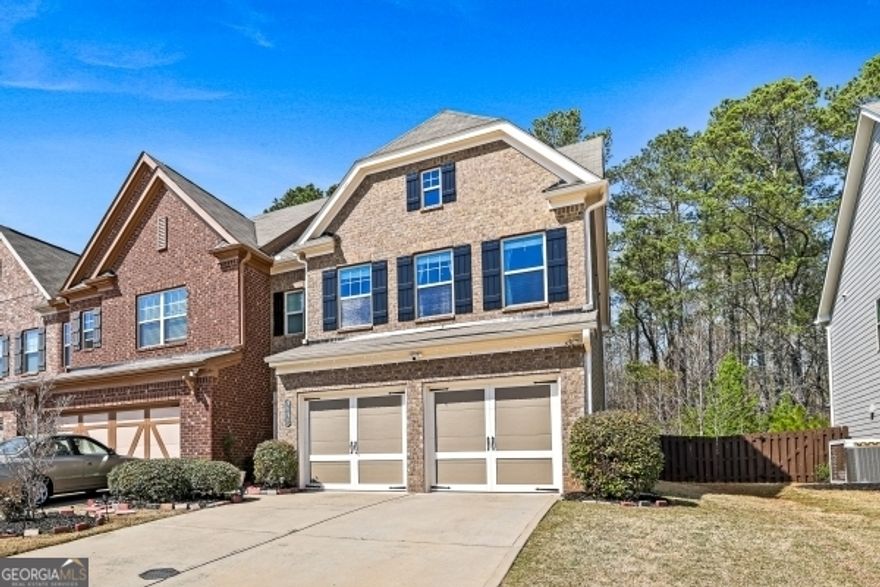 This spectacular 2-story end-unit townhome with spacious back and side yards! Bright, open floor plan featuring a fireplace and hardwood floors on the first level. Offers 3 beds, 2.5 baths, and a great cozy sunroom or screened room in the backyard to enjoy sunny evenings. Great room flows into the kitchen with granite counters, stainless steel appliances, and stained wood cabinets. Vaulted master suite with walk-in closet; master bath includes double vanity and separate tub/shower. HOA covers lawn care. Swim/tennis community in Alpharetta, Forsyth taxes.