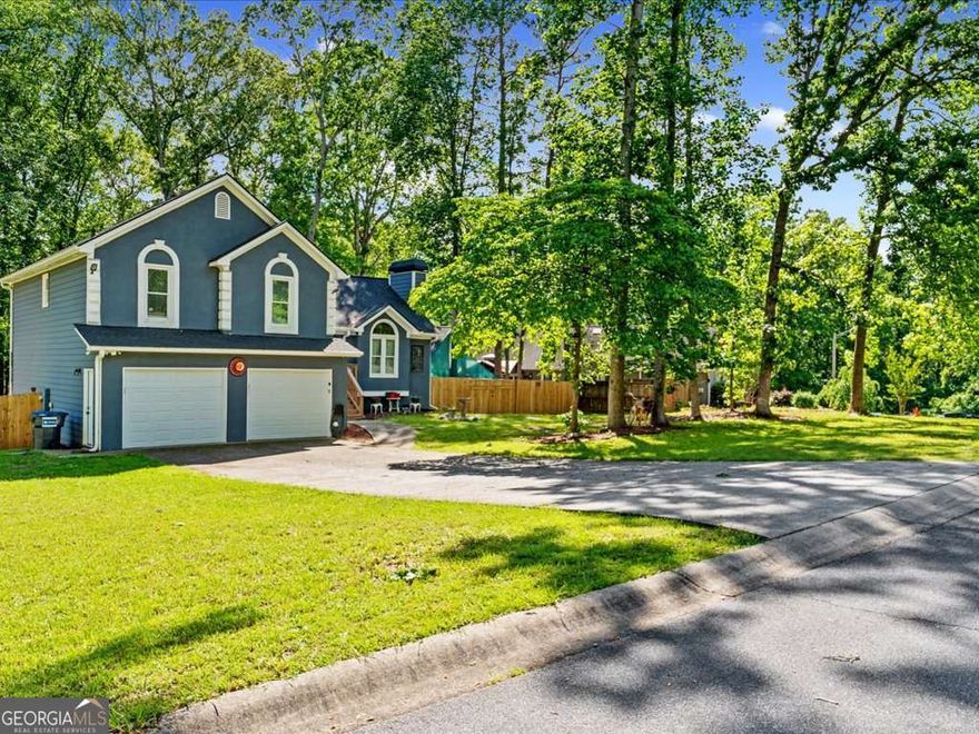 Incredible 4 bedroom house in Excellent School District!! Welcome inside to an oversized living room bathed in natural light & warmed by a fireplace! Completely updated kitchen with new cabinets, granite counters with matching backsplash & SS appliances!! Separate dining room with space for ALL your guests! LVP floors throughout main living areas! Bright & Spacious master bedroom with walk in closet! Master bath features custom tiled shower, double sink vanity, & tile floor! Modern secondary bathroom!!! Lower level has an additional bedroom with two closets!!! And a bonus room to be used as an office/gym!! Back yard is fully fenced and level!!!  This home will not last long!!!!