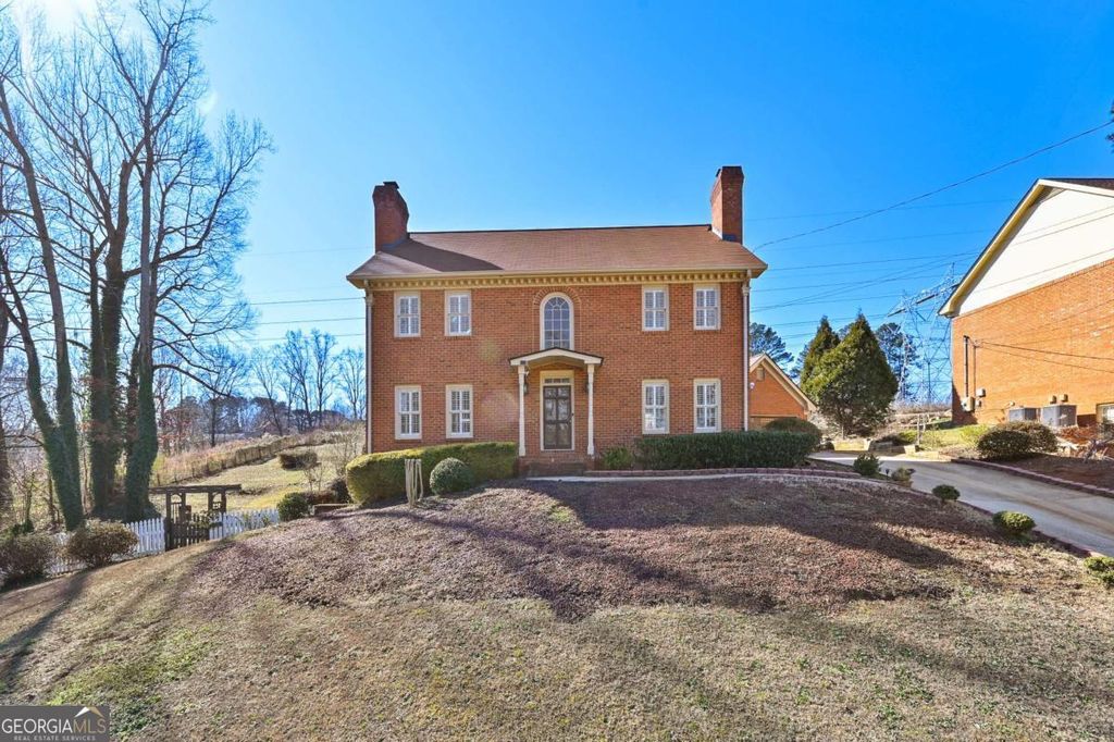 Photo of 110 Amsterdam Drive SW, Lilburn, GA 30047 (MLS # 10688262)