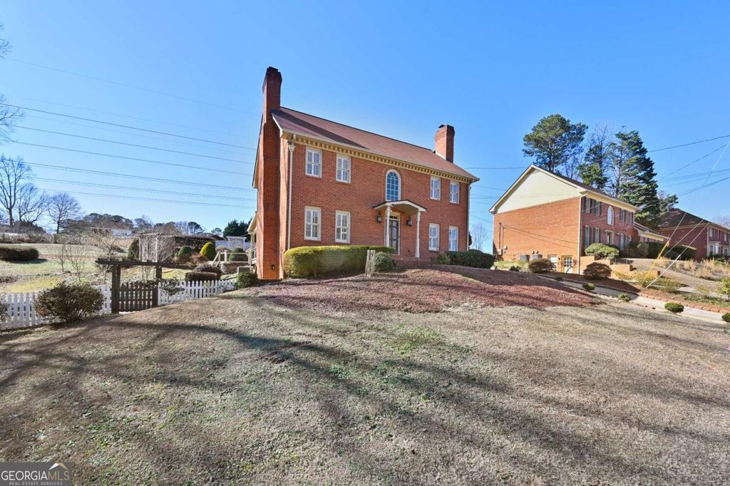 Photo of 110 Amsterdam Drive SW, Lilburn, GA 30047 (MLS # 10688262)