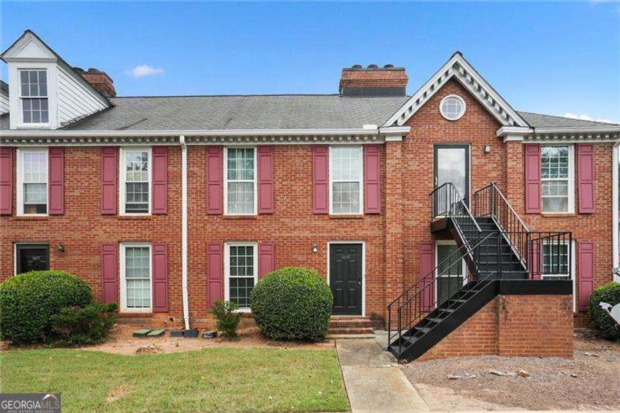 Welcome to this charming 2 bedroom, 2 bathroom condo in a gated community, perfect for those seeking a home surrounded by nature and filled with natural light. The unit offers a functional layout with a comfortable living area and a fully equipped kitchen. The community features a pool and secure gated access. Two assigned parking spaces are included for added convenience. Each bedroom has its own bathroom, offering privacy and convenience. Ideally located near Marietta Square, Kennesaw State University, and Truist Park, with easy access to I-75 and Cobb Parkway, you'll be close to great shopping, dining, and entertainment options. This home is perfect for commuters or anyone looking to enjoy the best of Marietta and the surrounding areas.