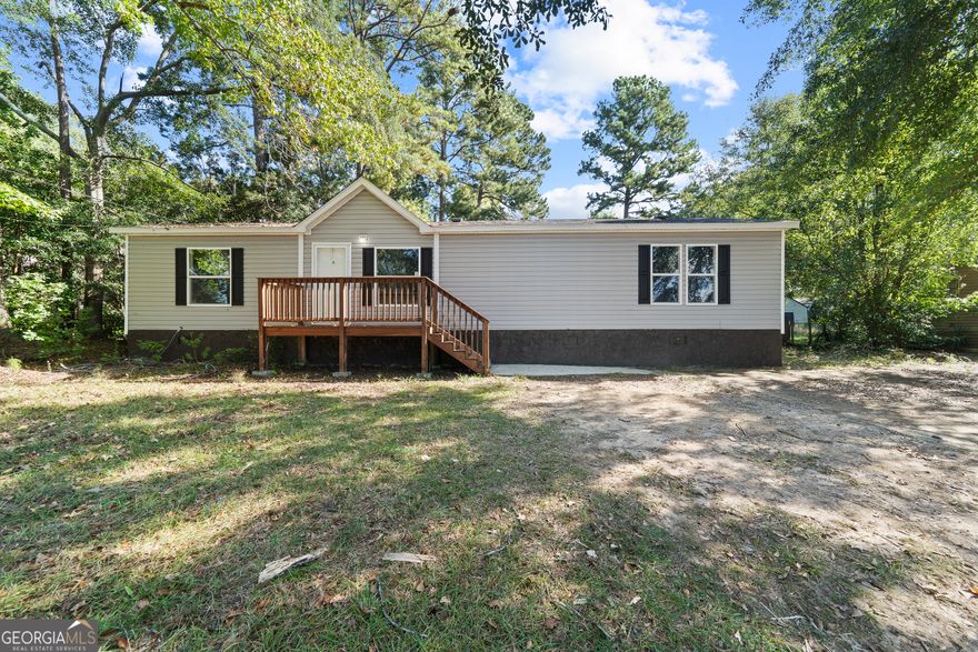 "Welcome home to this charming 2022-built manufactured home in the heart of Locust Grove!  Just across the street from Skyland Lake, this beautifully maintained 3 bedroom, 2 bathroom residence blends modern comfort with peaceful surroundings.  Step inside to find an open-concept floor plan featuring a spacious living area, an open kitchen with contemporary cabinetry, and plenty of natural light throughout. The primary suite offers a private bath with a walk-in shower and ample closet space, while two additional bedrooms provide ample space for family, guests, or a home office.  Enjoy evenings on your front porch with serene lake views or take advantage of the convenient location near schools, outlet shopping mall, and dining in Locust Grove. Whether you're looking for a full-time residence or a weekend retreat, this home combines style, affordability, and an unbeatable location. Call today with any questions! "