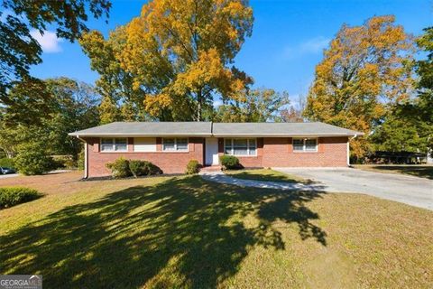 Photo of 7163 BLUEBIRD Ln, Lithia Springs, GA 30122 (MLS # 10636927)
