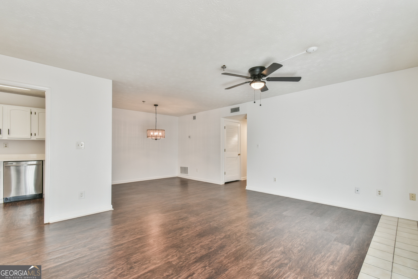 This top-notch property is ideal for those looking for a primary residence or investment opportunity. A well-designed, low-maintenance home with updated interiors, it offers both comfort and convenience. The oversized primary suite provides plenty of space for a cozy sitting area, while the secondary bedroom is equally inviting, offering ample room for guests. Adding to the home's versatility is a flex room, perfect for a home office, reading nook, or small library-allowing you to tailor the space to your needs. The open floor plan creates an inviting atmosphere, perfect for gatherings around the beautiful fireplace. The kitchen is well-appointed with plenty of space for cooking and entertaining. A rare feature in condo living, this end-unit home includes both indoor comfort and private outdoor enjoyment. Step onto your porch, surrounded by lush green space-an ideal spot for morning coffee or unwinding in the evening. This vibrant community offers fantastic amenities, including a swimming pool and well-maintained tennis courts, making it easy to stay active and socialize. Conveniently located near shopping, dining, and major highways, it's perfect for commuters. With its desirable location and low-maintenance lifestyle, this condo is an exceptional find for a new homeowner or investor. Don't miss out-schedule your showing today!