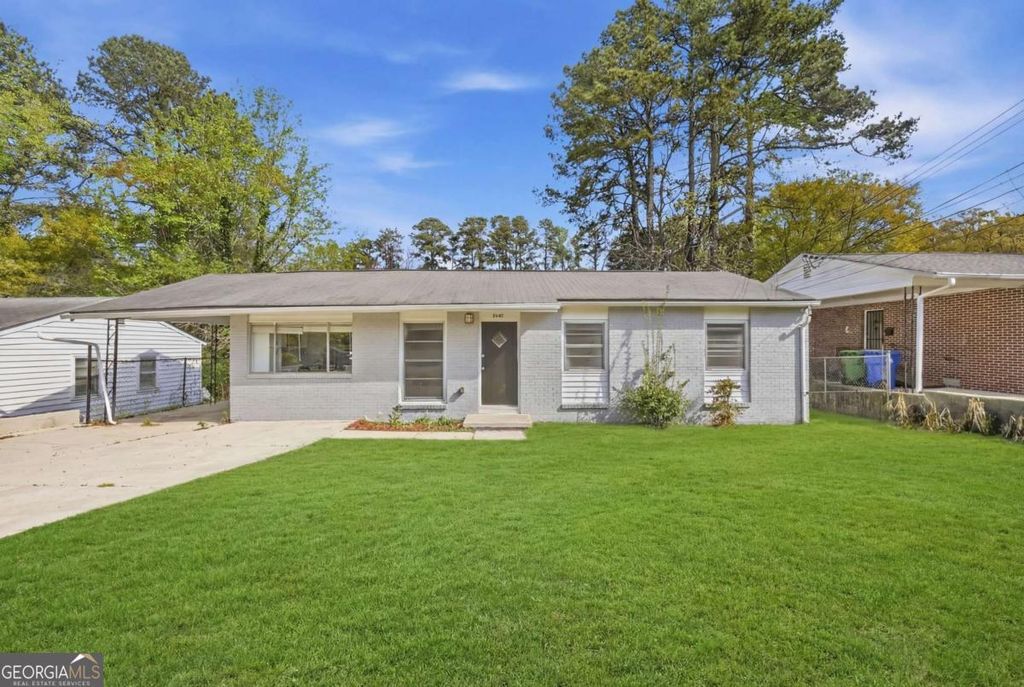 Photo of 2649 Santa Barbara Drive NW, Atlanta, GA 30318 (MLS # 10725596)