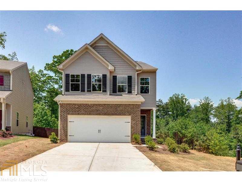 Beautiful New home in Sugar Hill, 4 bedroom w/ extensive hardwood floors on the main level, gourmet kitchen w/ granite counter tops, gas stove, Island. Master bath double Vanity, sep tub/shower. Huge back Yard, Unfinished basement. Great neighborhood and schools.