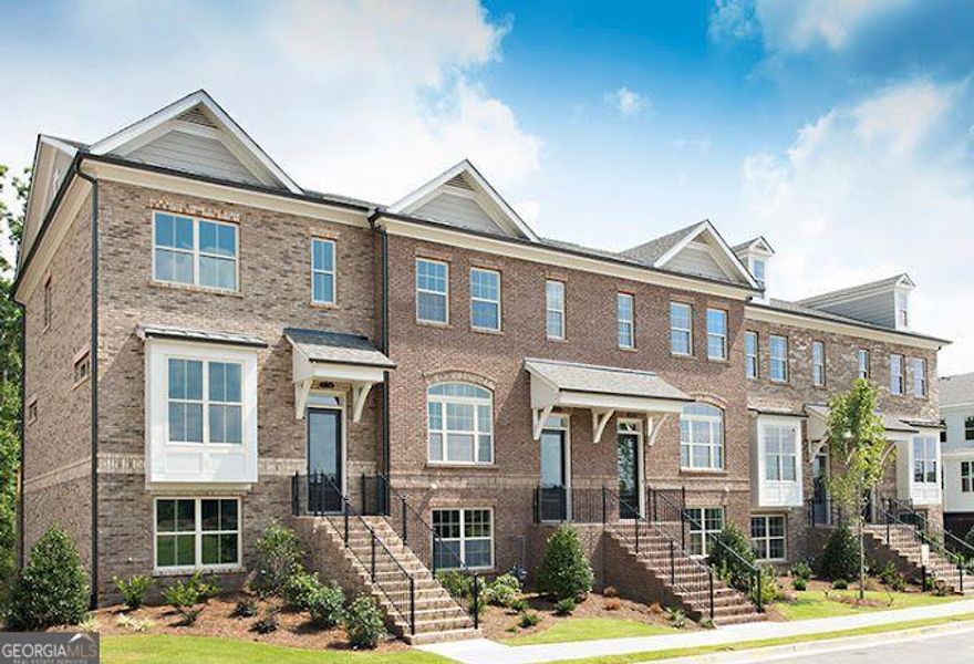 Agents do not show...please park in front of unit, third exit at roundabout to townhome on right, provides plenty of parking at your front door for visitors-no walking around the building!!!!!  Welcome to this lovely townhome in  sought after gated community of The Towns at East Village. Sophisticated open floorplan offers 3 Bedrooms & 3.5 Baths. As you enter, the finished Terrace Level  features a Bedroom w/recently remodeled  Full Bath, and access to the attached 2 Car Garage.  Upon entering the Main Floor, note the sunlit kitchen w/ White Painted Cabinets, Granite Countertops, Illuminated Peninsula, Under Cabinet Lighting, & Stainless Steel Cooktop, Oven, Dishwasher, & Microwave.  The Kitchen overlooks the Dining Area & Large Living Room.  This room has a FPLC w/Gas Logs, Ceiling Fan, & Custom Cabinetry flanking the FPLC. There is a Powder Room on this level along with a  Sunroom/Office Flex Space which adjoins the Living Room and Deck.  Upstairs you find a 2nd Bedroom & Private Bath, Laundry Closet, & a Spacious Master Suite  with Trey Ceiling, Two Walk-in Closets, Double Vanities, Oversized Shower, & Water Closet.  The home features Hardwood Floors on Terrace & Main Level.  Window Blinds are throughout & lots of closets for storage. Shows like a Model Home!  The Towns at East Village offer a convenient location minutes to shopping, restaurants, schools, parks, 400, Downtown Roswell, Peachtree Industrial, Chattahoochee River Parks & Trails.   ***Tax Bill reflects both City and County Taxes