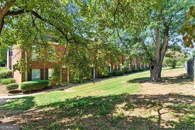 Photo of 235 Winding River Drive #B, Atlanta, GA 30350 (MLS # 10871213)