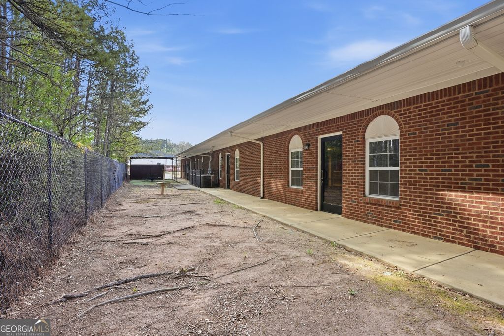 Photo of 9478 Winding Way Lane, Jonesboro, GA 30238 (MLS # 10721977)