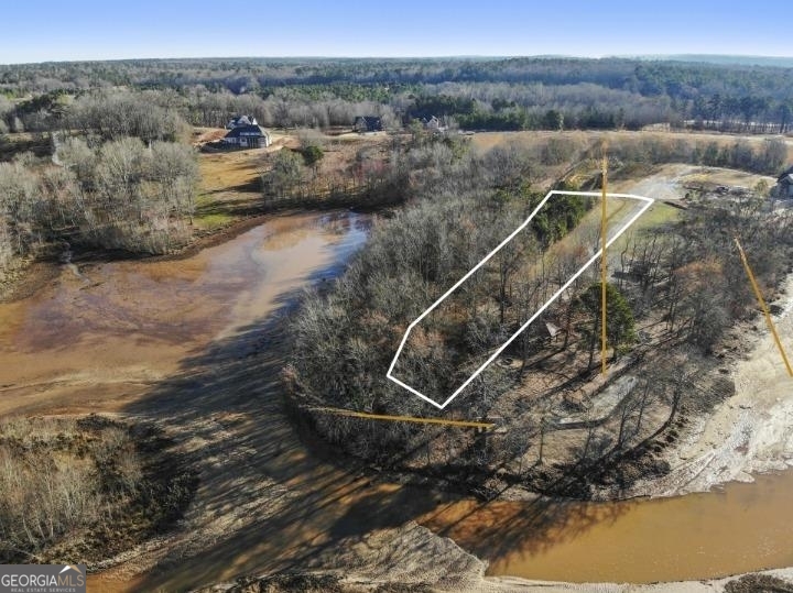 Don't miss out on this rare opportunity to secure a piece of prime real estate in one of Macon's most coveted neighborhoods. Whether you're looking to build your forever home or make a savvy investment, this land for sale at 519 Bluewater Bay Dr offers endless potential for realizing your dreams.start planning your future in this picturesque location.
