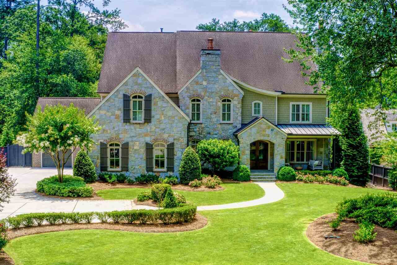 Incredible opportunity for resort-style living in the heart of the city! Perfectly located STEPS from Chastain Park, Atlanta’s premier outdoor destination, this totally upgraded, better-than-new construction opportunity checks ALL the boxes!!! Simply take one step inside this elegant home to experience for yourself the high-quality construction and attention to detail. Once inside you will find a warm, welcoming living space, accented with exposed cedar wood beams, grand fireplaces, cozy gathering spots with private views onto the lawn and outdoor areas ready to entertain your closest family and friends. The kitchen features an oversized island with unique semi-precious marble countertops, an upgraded appliance suite including two beverage drawers, a warming drawer, two ovens, a built-in Miele espresso/coffee maker and boundless storage for all your essentials and more. Additionally, each of the six bedrooms offers an en-suite bathroom and generous closets, punctuated by a show-stopping owner’s suite that features magnificent, vaulted ceilings. Truly everything you need under one roof, downstairs in the newly finished basement you will find a glass enclosed home gym, movie room with kids' loft, wet bar and one of the two home offices with direct access outside and beautiful afternoon sunlight. Upstairs you’ll find a great arrangement of rooms with one of the most fantastic laundry rooms you have ever seen complete with an island, four washer/dryers and a full-size refrigerator. Once outside you’ll find a three-car garage, a golf cart/bike garage and an expansive one-of-a-kind flat backyard with resort style landscaping featuring blue stone decking, a fabulous gunite pool and spa - perfect for entertaining!! Marvelously situated on just over one acre of flat land in the heart of the prestigious Chastain Park, wide open spaces abound, and top-rated schools are within walking distance. Built and designed with attention to detail by the accomplished builder Steven Powell and noted landscape architect Jason Englert, this home is an incredible opportunity to have it all and still enjoy all the conveniences and culture of the city!