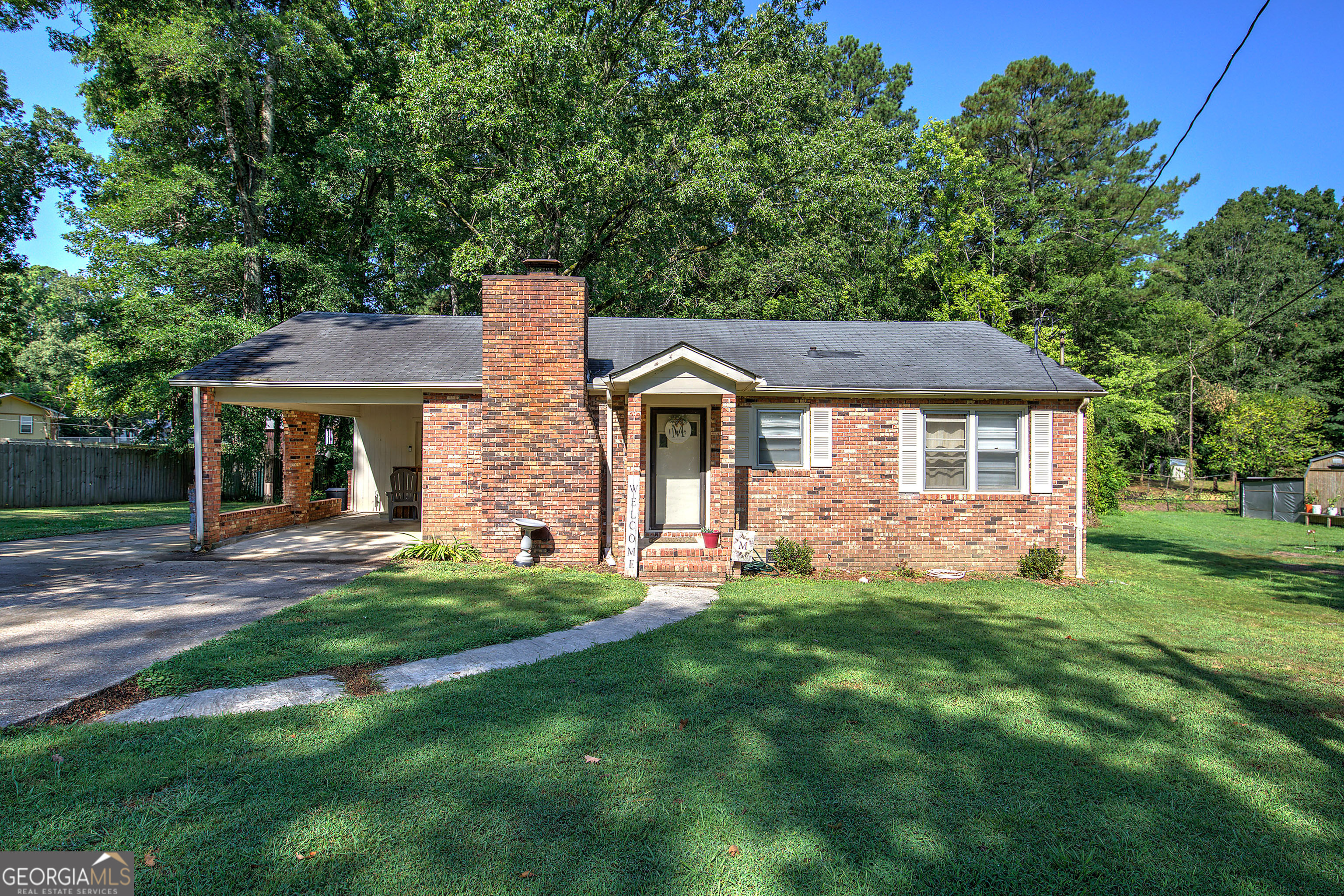 Looking for an all brick home with "extras"? This might be it! This lovely home features a brick exterior, large brick fireplace, oversized owners suite and a beautiful back enclosed porch. The level backyard has a great above ground pool and a detached storage building. The property is located close to Richard B. Russell Airport in Armuchee, GA.