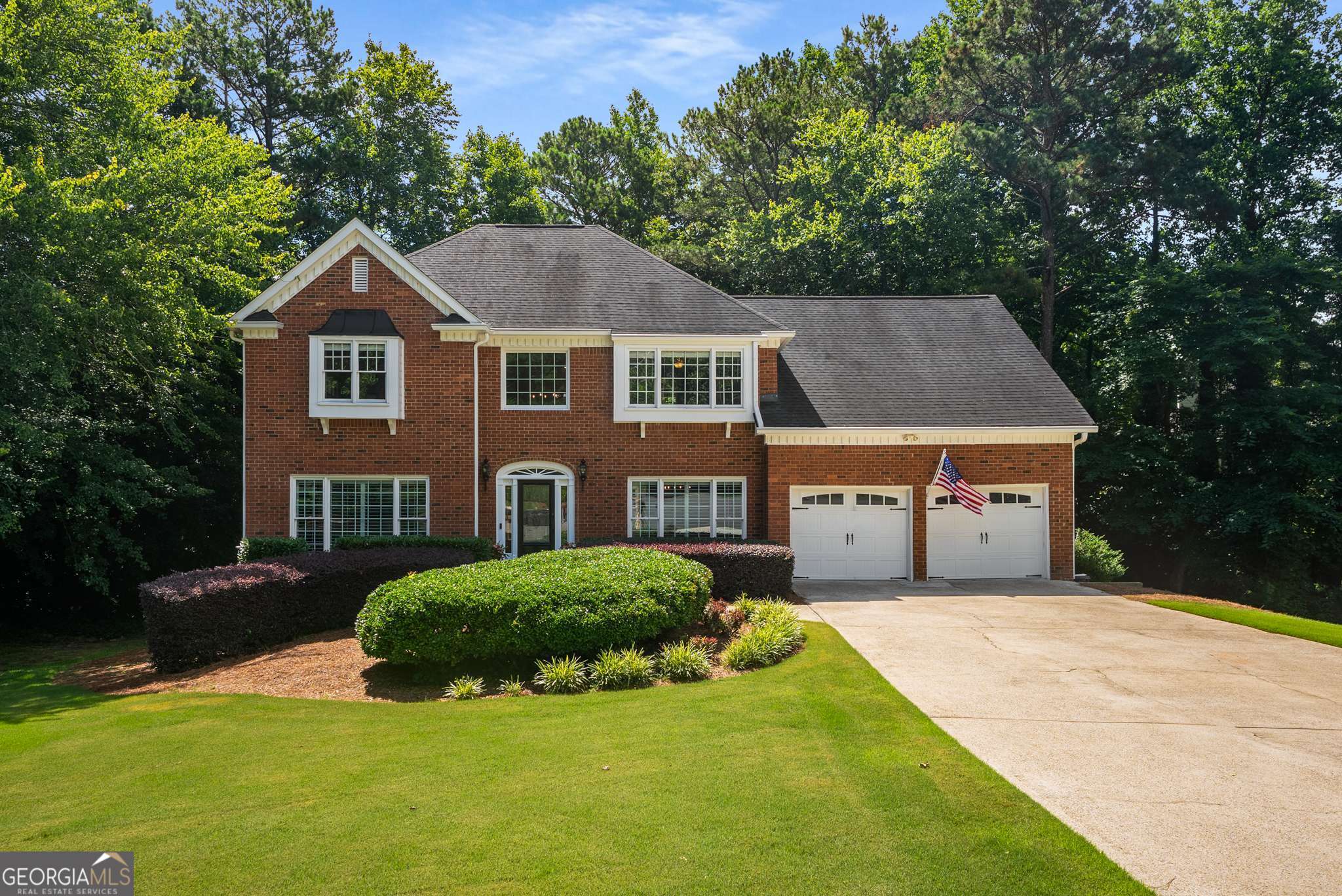 This stunning brick home is tucked away on a quiet cul-de-sac lot in one of East Cobb's most desirable swim/tennis communities. It offers the perfect blend of elegance, comfort, and functionality-all within the top-rated Walton High School district. You are greeted by a light-filled two-story foyer with hardwood floors that flow seamlessly throughout the main level. This home features expansive living spaces, including a dedicated home office or study, a formal dining room, and a warm, fireside family room. The kitchen is a true standout that was completely renovated in 2023, featuring light gray cabinets, stone countertops, SS appliances, and plenty of space for cooking and entertaining. Upstairs, you'll find a truly spacious owner's retreat with a spa-like bath with double vanities, a seamless glass shower, and a large custom walk-in closet. Three additional bedrooms and two full baths provide an abundance of space. The terrace level is ready for entertaining with a rec room, full bath, bar area, and a large unfinished space-perfect for storage or future expansion. This home is located in the sought after Chadds Lake offering swim/tennis and community lake perfect for canoeing, kayaking, and fishing. This home checks every box and offers exceptional value in a coveted East Cobb location. Don't miss your chance-schedule a private showing today and make this your forever home!