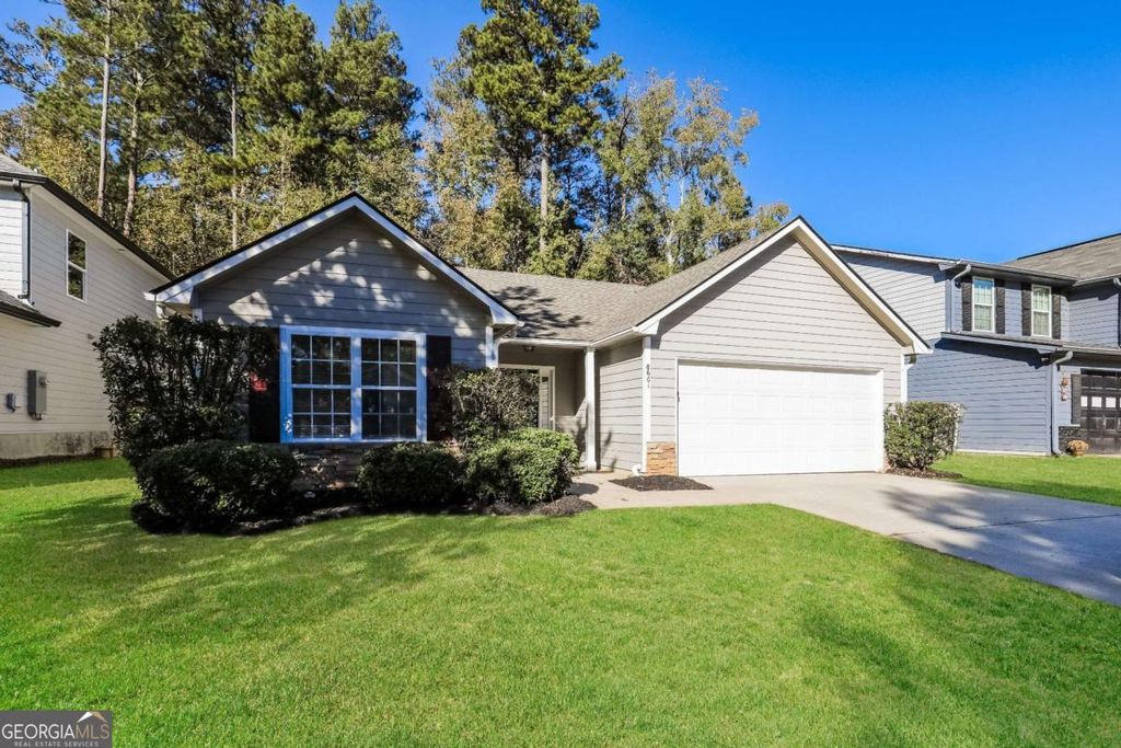 Photo of 8661 Guthrie Drive, Riverdale, GA 30274 (MLS # 10639439)