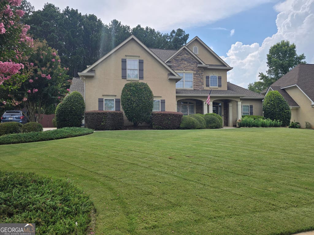 Photo of 1214 McAllistar Drive, Locust Grove, GA 30248 (MLS # 10816029)