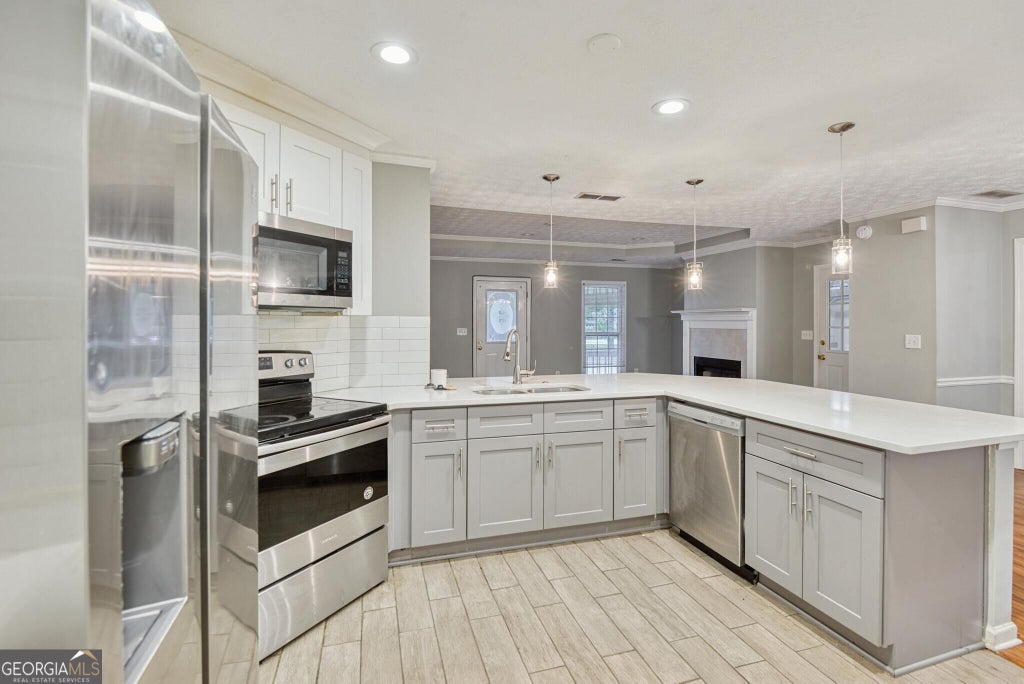 Photo of 2880 Highpoint Road, Snellville, GA 30078 (MLS # 10870994)