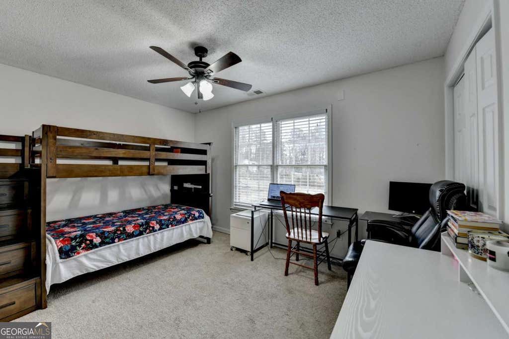 Photo of 161 Muddy River Road, Lawrenceville, GA 30043 (MLS # 10799285)