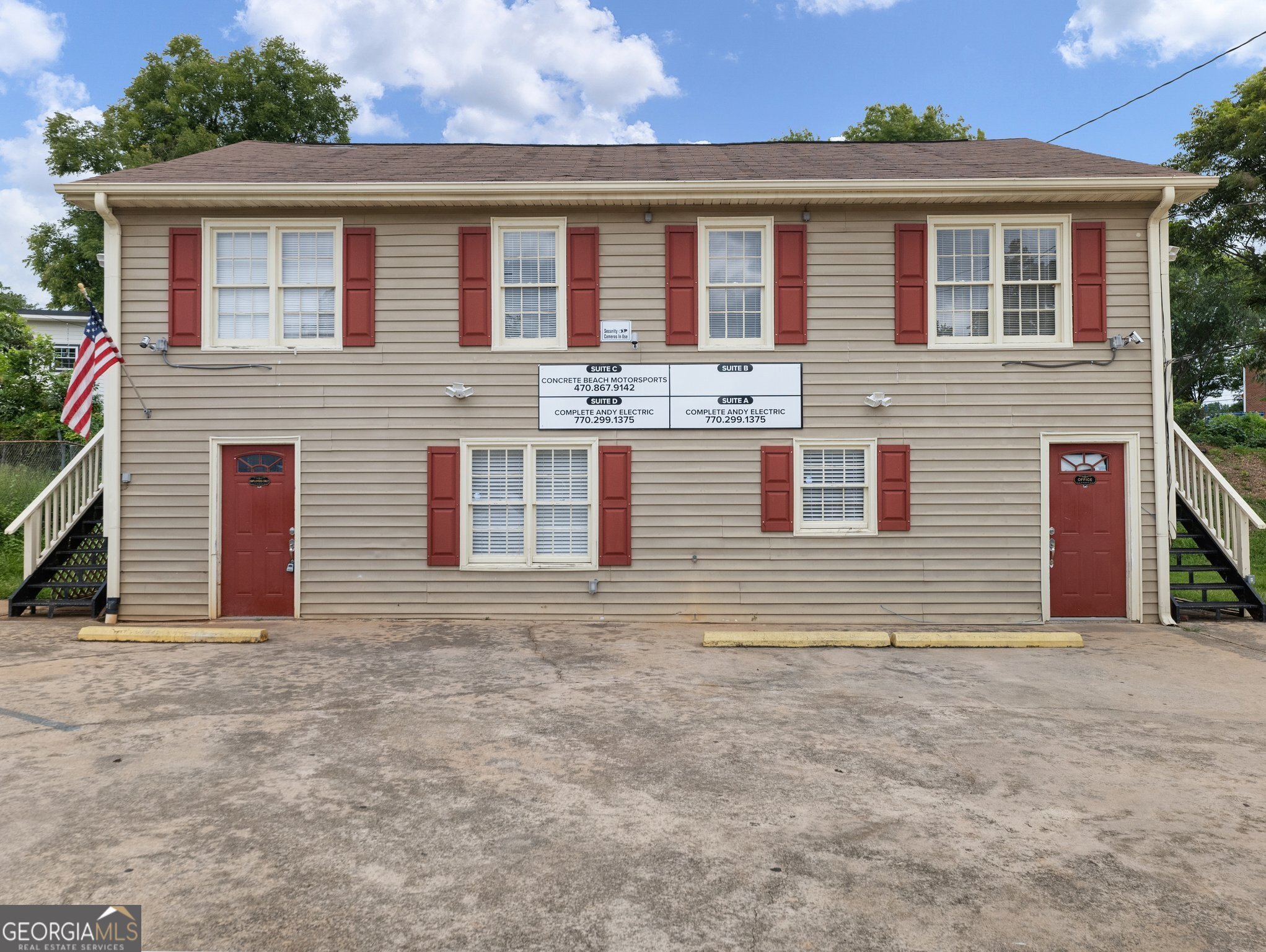 Commercial Office Space in Downtown Buford, just one street south of Main Street. Located Behind the Buford Grill and steps away from Rico's World Kitchen; catty Conner to Main Street Blooms. Free standing multi-unit building with its own parking lot. Building consist of 4 units, each unit has independent entrances, electric meter and HVAC. The downstairs units A & D have been combined and used as a single unit, but could easily be closed/converted and used as two separate units. Two units are leased; Unit C is leased to Used Auto Broker, Unit B is leased to a Renovations Company. City of Buford has approved the construction of a side walk on West Moreno Street. Please consult with the City of Buford for more details on this project. Lots going on in this street, Moreno Street has a new 256 space parking deck, Meander Brewing on West Moreno -soon to open will be a great hangout spot, additionally on Moreno Street is Tchin Tchin Coffee.