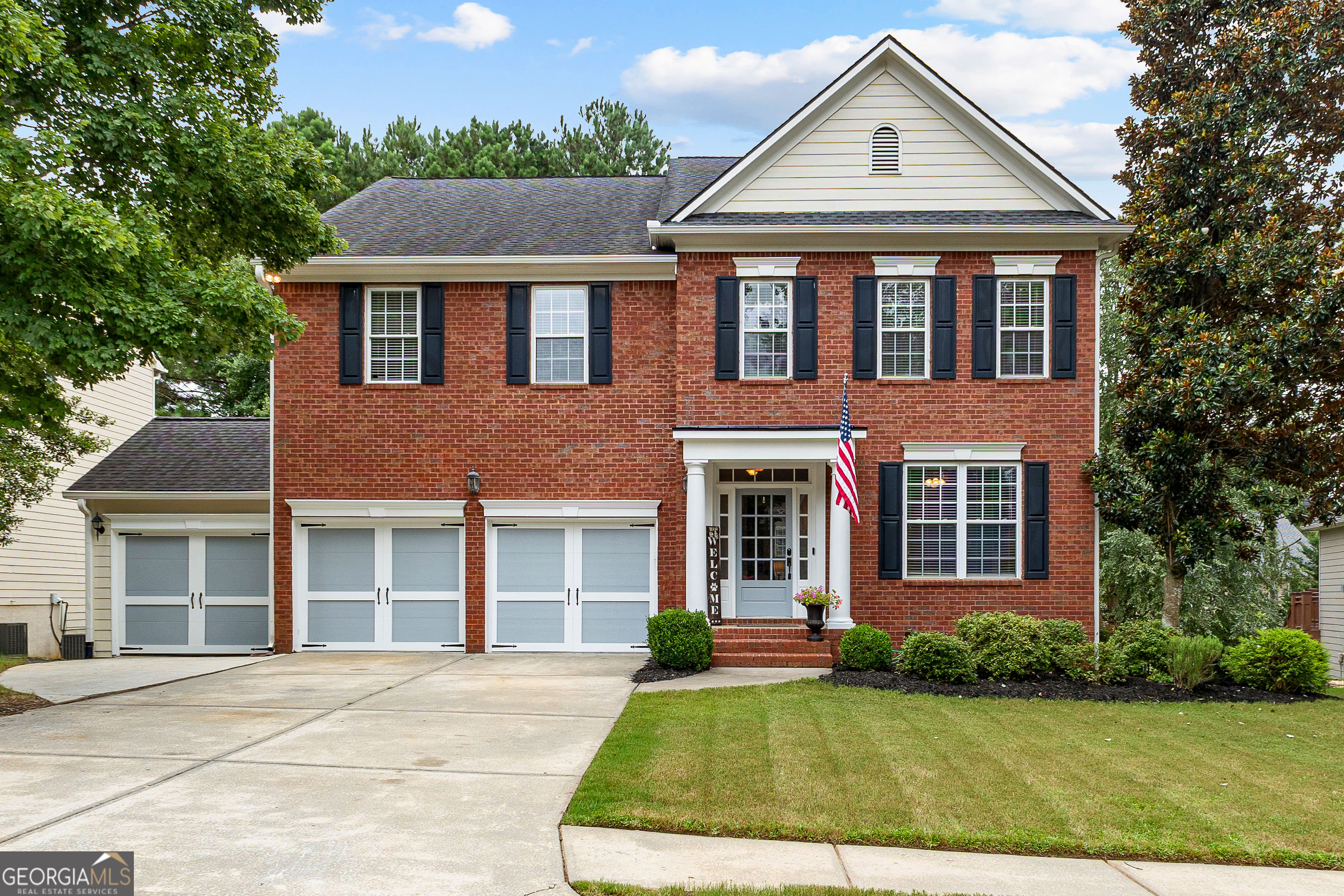 Fall in love with this gorgeous Centennial home-spacious, beautifully finished, and ready for you to move right in! Featuring an open floor plan, a full finished basement, a relaxing hot tub that stays, and one of Peachtree City's most sought-after locations, this home is perfect for everyday living and entertaining. This spacious home features an open floor plan with hardwood floors on the main and upper level, a family room with built-in bookshelves and a gas starter fireplace, a formal dining room, and a separate office/study. The kitchen offers granite countertops, kitchen island, gas stove/oven combo, microwave, tile backsplash, under-cabinet lighting, and a breakfast area. Mudroom conveniently located off the 3-car garage. Upstairs, you'll find the oversized owner's suite with double vanities, tiled shower, and walk-in closet. Four additional bedrooms and two full baths are upstairs, along with the laundry room. The finished basement is perfect for entertaining with a spacious rec room, bar area, media room with built-ins, full bath, and additional unfinished storage. The bonus room off the basement, makes the perfect workshop/workout room and offers additional storage. Enjoy the fenced backyard with an extended patio, fire pit, large upper deck, and hot tub that stays with the home. Centennial offers fantastic amenities including swim, tennis, clubhouse, playground, and sidewalks. Convenient to award-winning schools, shopping, dining, and Peachtree City's golf cart path system. Come see for yourself how easy it is to fall in love with this home, this neighborhood, and this way of life in Peachtree City. Schedule your tour today before it's gone!