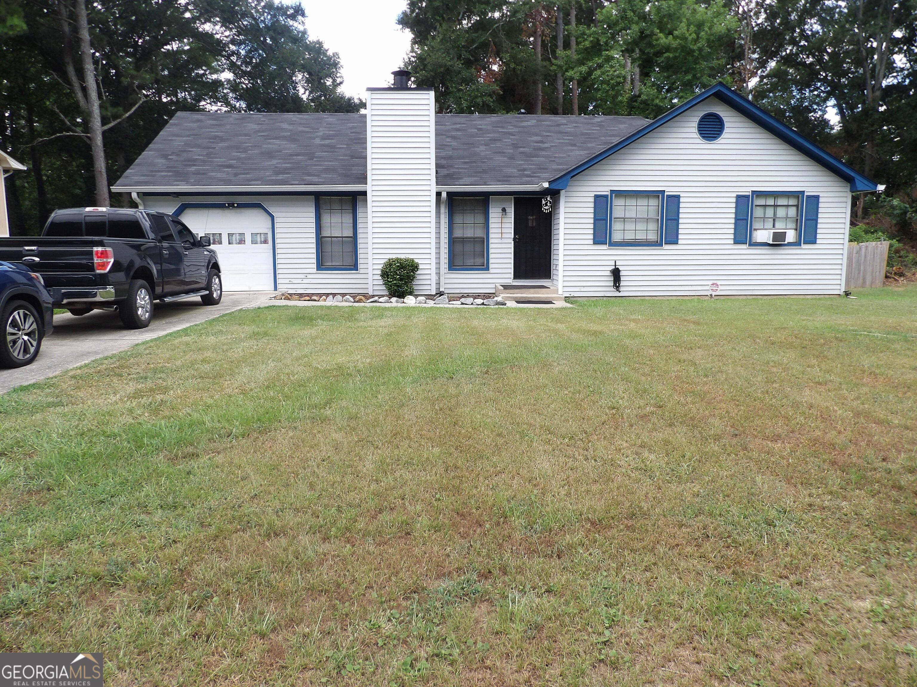 Wow and amazing for the price. This cozy, beautiful ranch home with huge fenced backyard space, screened in back patio (has a veranda feel). 1 very sizable Owner suite with a double-vanity bathroom, and walk -in closet. Two more appointed rooms. Spacious living room with a large but cozy fireplace. Very nice country style kitchen. Attached Garage . New roof, new hot water heater and new HVAC. A must call and must view in Riverdale. Can walk to Bus line. Note: window unit to be removed, was temporary until new HVAC installed. Call for an appointment.