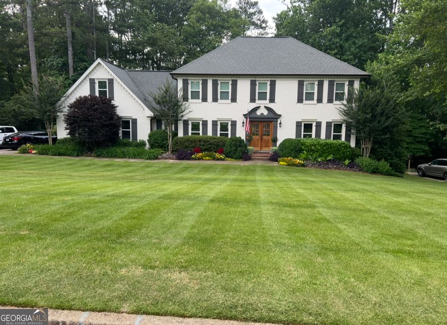 Beautiful traditional home in sought after Crabapple area.  Walking distance to Crabapple Elementary, Northwestern Middle School / blue ribbon school district & Milton High School. Walk to Old Blind Dog or a short drive either downtown Alpharetta or downtown Roswell.  Three sided white brick, 4 bedroom 3.5 bath. Partially finished basement and nicely landscaped yard with outdoor lighting and new irrigation system.