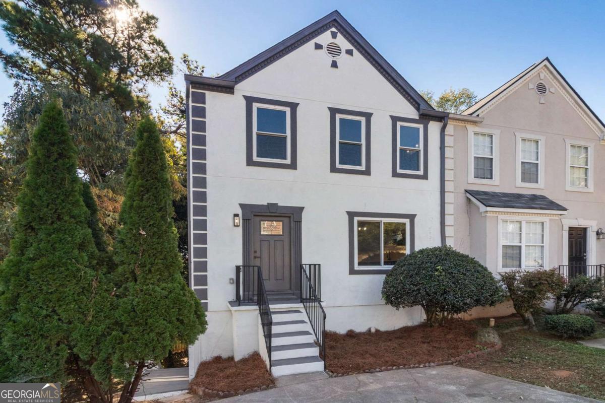 Stunningly renovated 4 bed/2.5 bath townhome with full basement featuring brand new Luxury Vinyl Plank flooring, brand new HVAC, new interior and exterior paint, new lighting and plumbing fixtures everywhere, new granite countertops in kitchen and bathrooms, and new stainless-steel appliances. Large living room offers fireplace, two French doors to the deck that allow in lots of natural lighting, and views to the kitchen. Large kitchen offers plenty of cabinet and countertop space, new granite, new stainless steel appliances, pantry, and eat in kitchen area. Large Master bedroom offers big windows allow in lots of natural lighting and En-suite with double vanity, low flow toilet, and tub/shower combo. Two secondary bedrooms upstairs and secondary bathroom with large vanity, low flow toilet, and tub/shower combo. Full finished basement offers the fourth bedroom and bonus room/recreation room/den. Out back the two story decks overlook the fenced in backyard waiting for your personal touches.