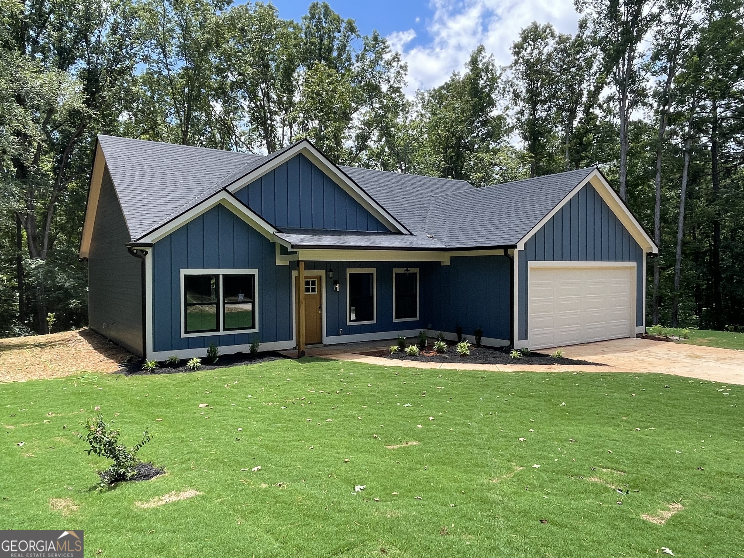 Come enjoy the charm and convenience of this brand-new, thoughtfully built 3-bedroom, 2-bath home in a friendly lake-access community. With 1,501 square feet of living space, this home offers just the right amount of room to spread out without feeling overwhelming. Step inside and you'll find a well-designed layout with modern touches throughout. The primary suite is a true retreat-featuring a large, upscale walk-in shower, double vanities, and a closet that makes staying organized a breeze. The home is fully spray-foam insulated, keeping it energy-efficient and comfortable all year round. Outside, you're just a short walk or golf cart ride to the community's lake access-perfect for weekend paddling, fishing, or simply relaxing on the water. And the location couldn't be better: only 5 miles from Lake Oconee Academy and St. Mary's Hospital, and just 7 miles from the Publix shopping center and charming downtown Greensboro. Easy access to I-20 makes commuting or traveling a cinch. Come see what life can feel like when home just makes sense.