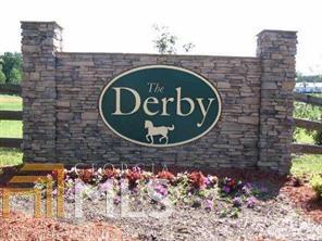 5 acre corner lot available in The Derby- equestrian acreage neighborhood. The Derby is a small neighborhood community of fine homes on large lots perfectly located between Cartersville and Rome. Just off Hwy 411 and only 15 mins. to I-75. Cleared off, soil tested, and just waiting on you to build your dream home!