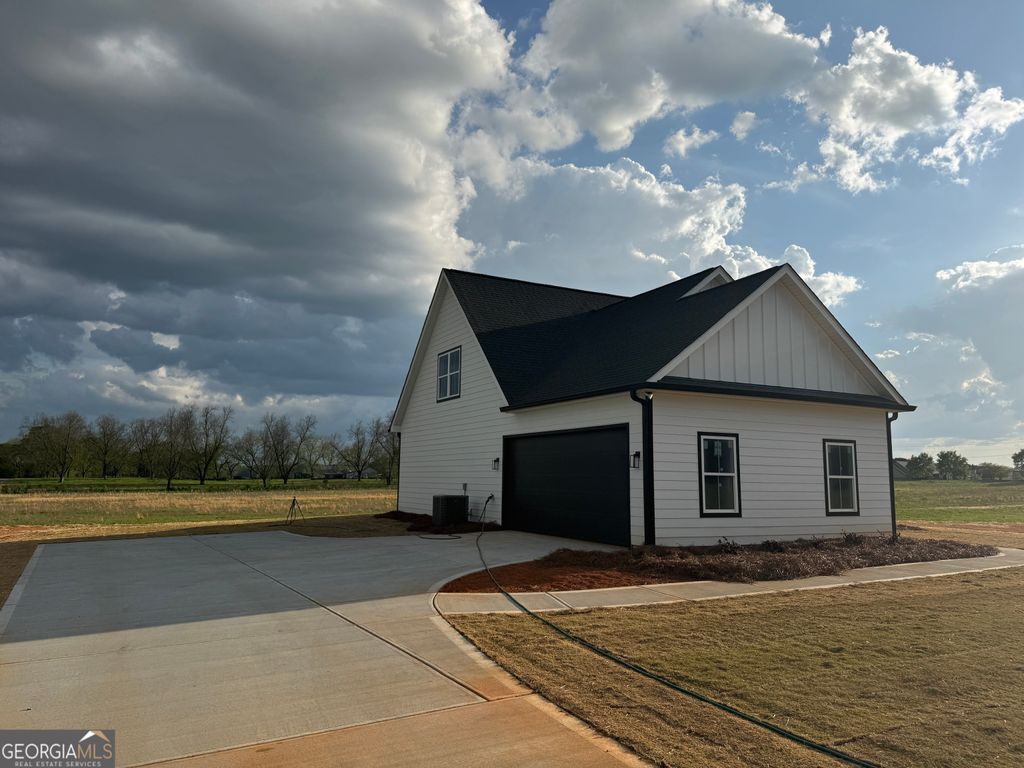 Photo of 160 Melville Brown Road, Williamson, GA 30292 (MLS # 10724672)