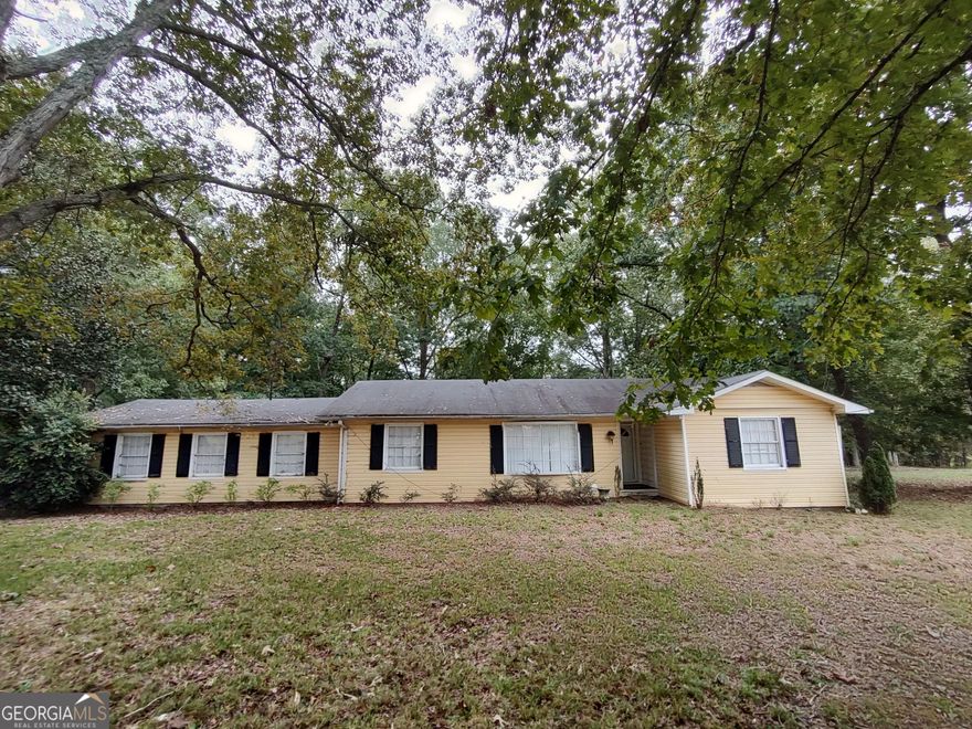 Large ranch style home with spacious lot! Includes updated kitchen with stainless appliances and tile backsplash, spacious bedrooms, and renovated bathrooms. Enjoy the large trees that provide plenty of shaded yard area. This charming single-family home is nestled in a vibrant and welcoming neighborhood, offering the perfect blend of city convenience and suburban charm. Easy access to shops, restaurants, and major highways for convenient commuting. Experience the perfect blend of style, comfort, and location! Schedule a viewing today and make this gem your own!