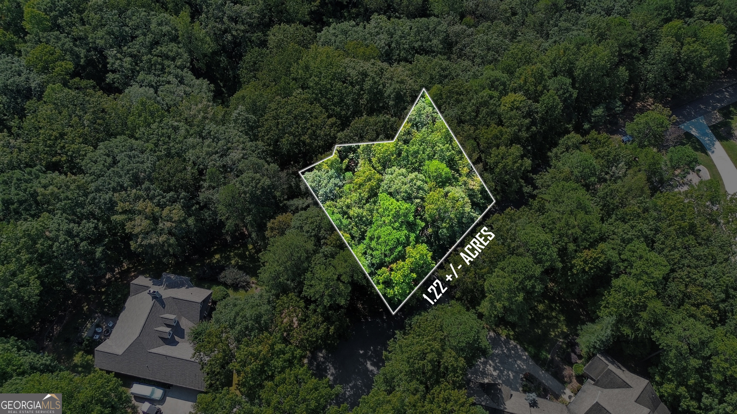 Tucked inside the gated Orchard Golf & Country Club, this 1.22-acre lot offers privacy, natural beauty, and the perfect setting for your future home. The sloped, wooded terrain creates opportunities for a custom build with character-ideal for a walk-out terrace level, or a retreat that blends seamlessly into the landscape. Beyond the homesite, enjoy all the amenities The Orchard has to offer. By joining the club, you'll have access to an 18-hole championship golf course, pool and grill, tennis courts, and the increasingly popular pickleball courts. Just minutes from charming downtown Clarkesville, you'll have both convenience and the quiet of a private mountain community.Whether you're envisioning a full-time residence or a seasonal getaway, this lot provides the setting to bring your vision to life in one of Northeast Georgia's premier communities.