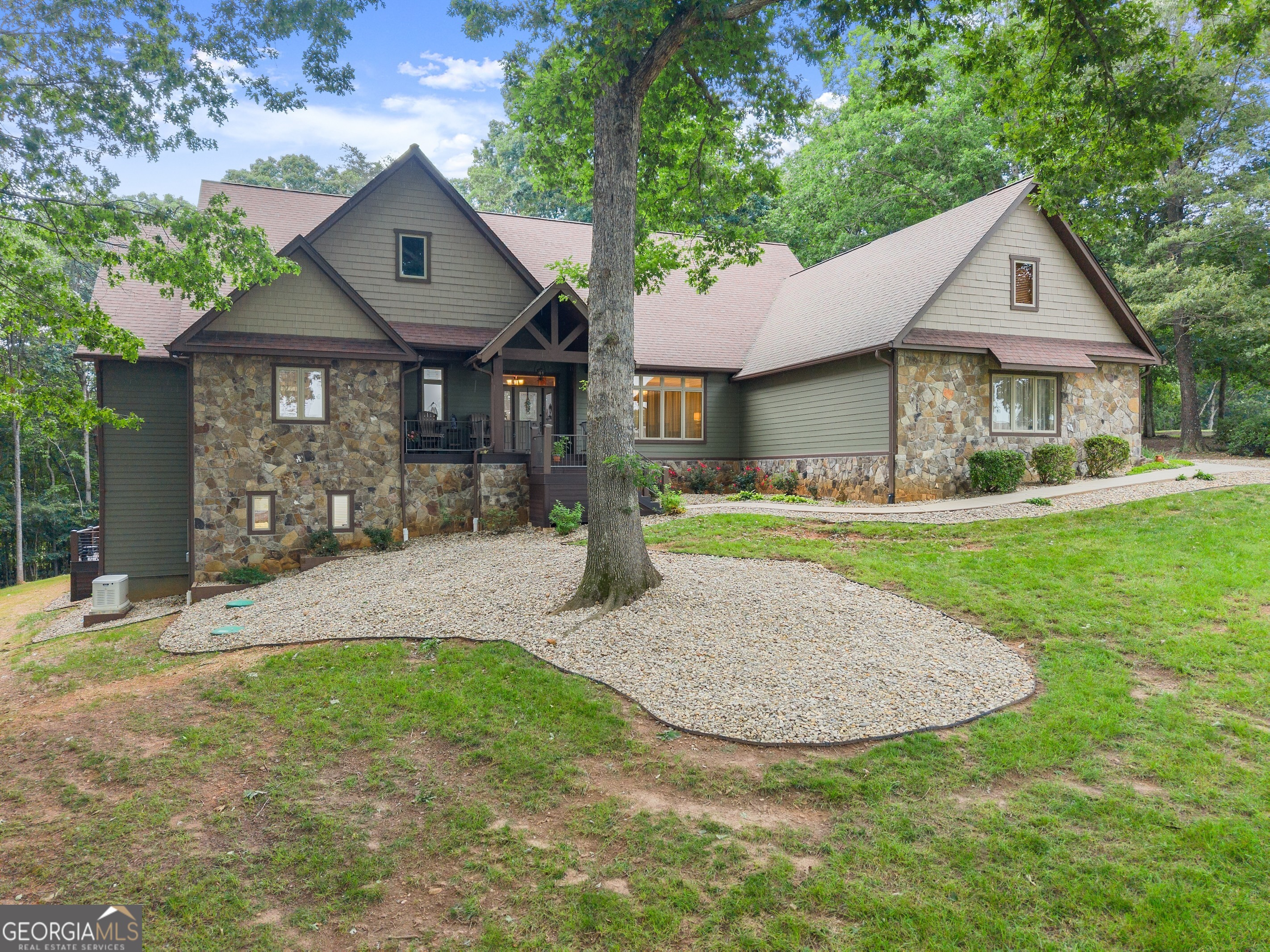PRICED UNDER CURRENT APPRAISED VALUE! Welcome to 712 Meadow Run Court. The extraordinary and meticulously maintained custom home on 3.05 acres is nestled within a large cul-de-sac lot in the Rockford Farm subdivision. This masterpiece offers the perfect blend of luxury, comfort, and modern elegance with an oversized back yard with privacy and ample room to entertain. Featuring 5,588 finished square feet, 4 bedrooms, including the oversized primary and 4 1/2 bathrooms, large closets and ample storage each room contains high end finishings. The gourmet kitchen boasts high-end appliances, custom cabinetry, a walk-in panty, large kitchen island and breakfast area. Around the corner you will find the sitting room/den (separate from the large living area). The fully finished basement offers additional entertainment space, an in-home workshop and so much more. Enjoy the quiet sounds of nature from the partly covered and screened rear deck overlooking the manicured yard and wooded view. From the beautiful hardwood floors to the thoughtfully placed tongue-and-grooved ceilings and all of the upgrades and finished in between, this home will not disappoint. Located within just a short drive of down town Clarkesville this home is awaiting its new owners to call it home.