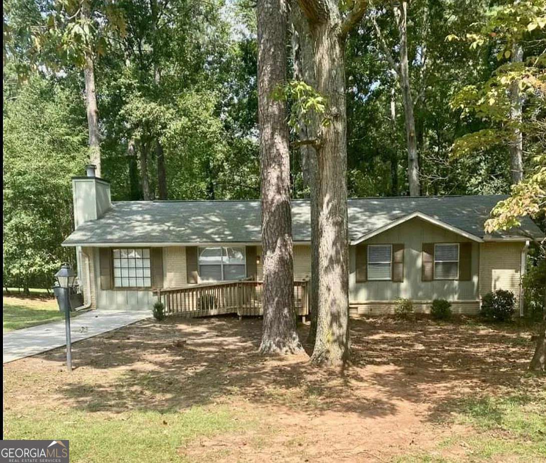 Income producing property! Updated ranch, open concept living area. White kitchen with granite. 3 bedroom, 1.5 bathrooms
