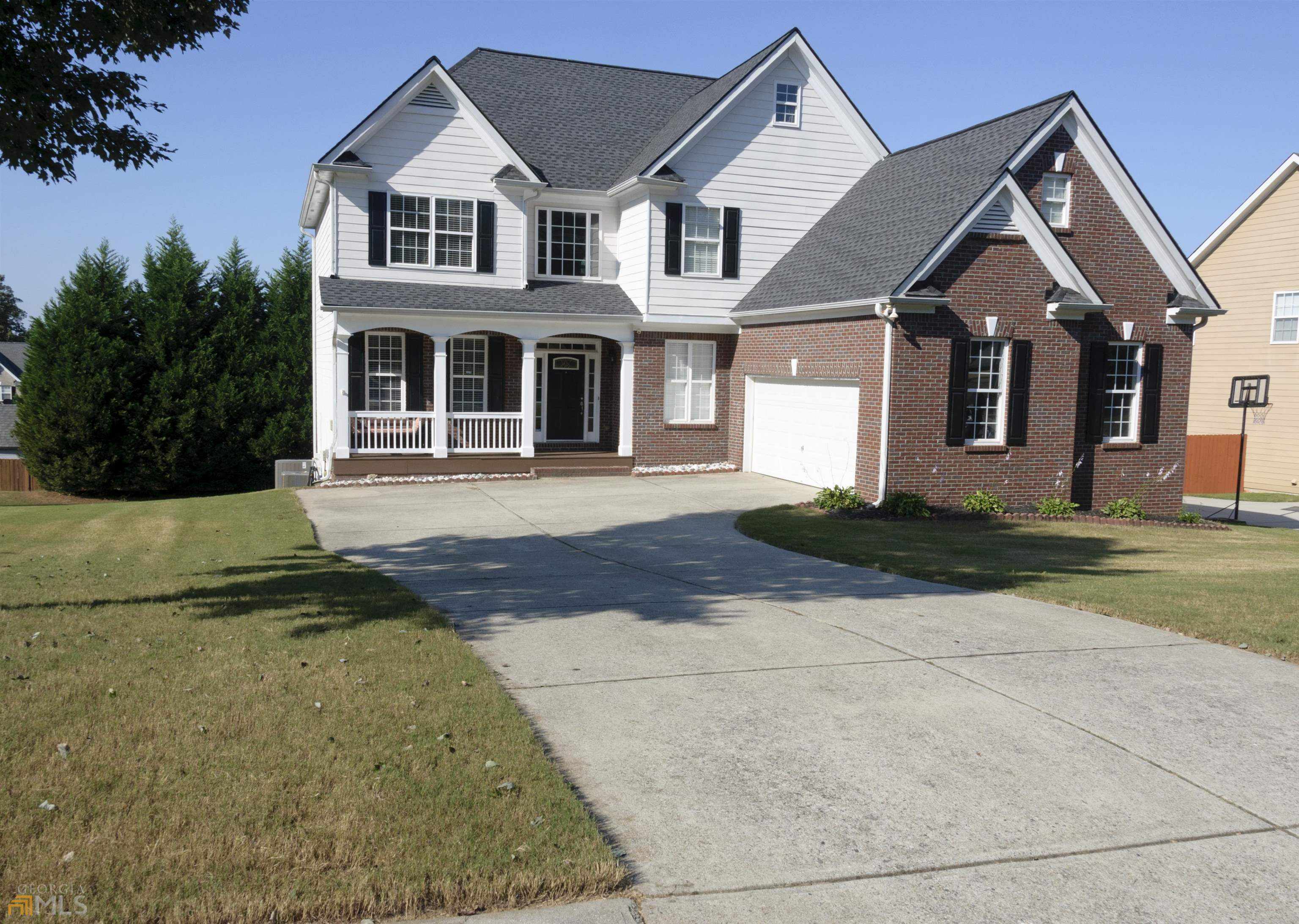 Very large home featuring 5 bedrooms, 4 full baths and a 2 car garage. This home has a very spacious kitchen with an island and a dining area. There is also a large dining room and family on the main level. There is a guest bedroom on the main level for your guests. The second level has the master bedroom with a new master shower installed in 2018. New A/C units and a new roof installed. This home is a must see schedule showings with the listing agent (706)983-9988.